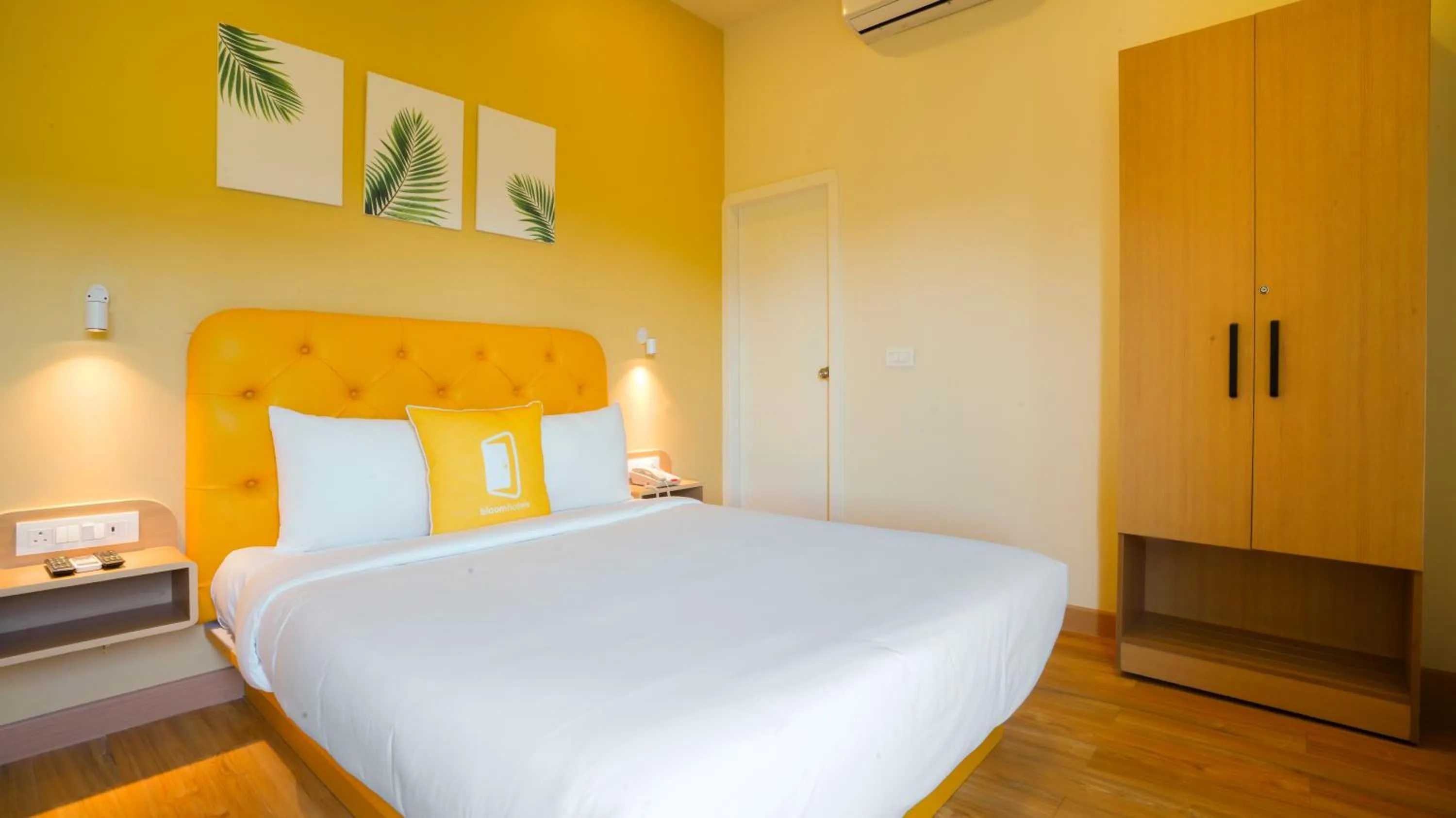 Photo of the whole room, Bed in Bloom Hotel - Magarpatta