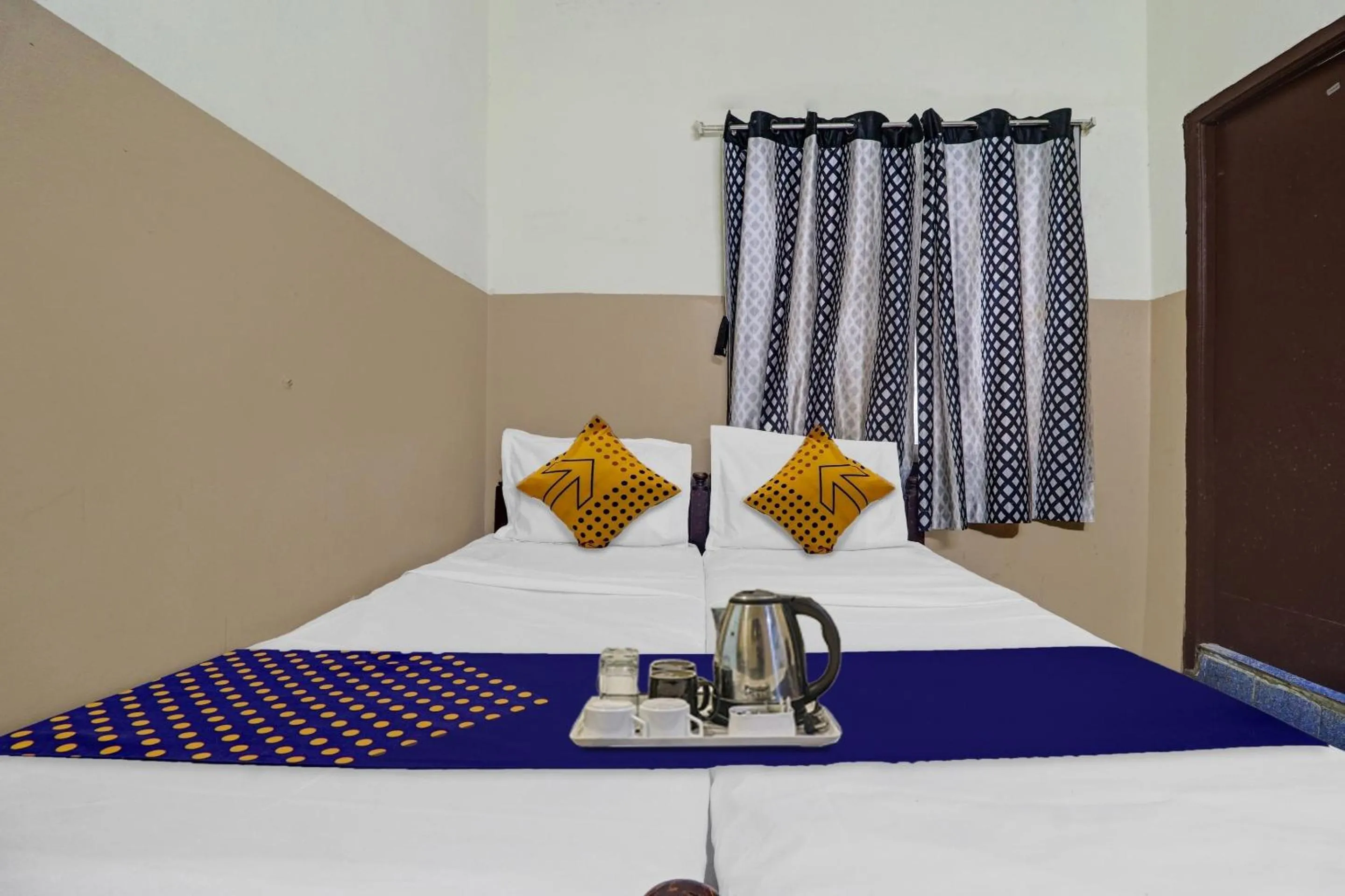 Bedroom, Bed in SPOT ON Sri Sai Lohith Lodge Near Secunderabad Railway Station