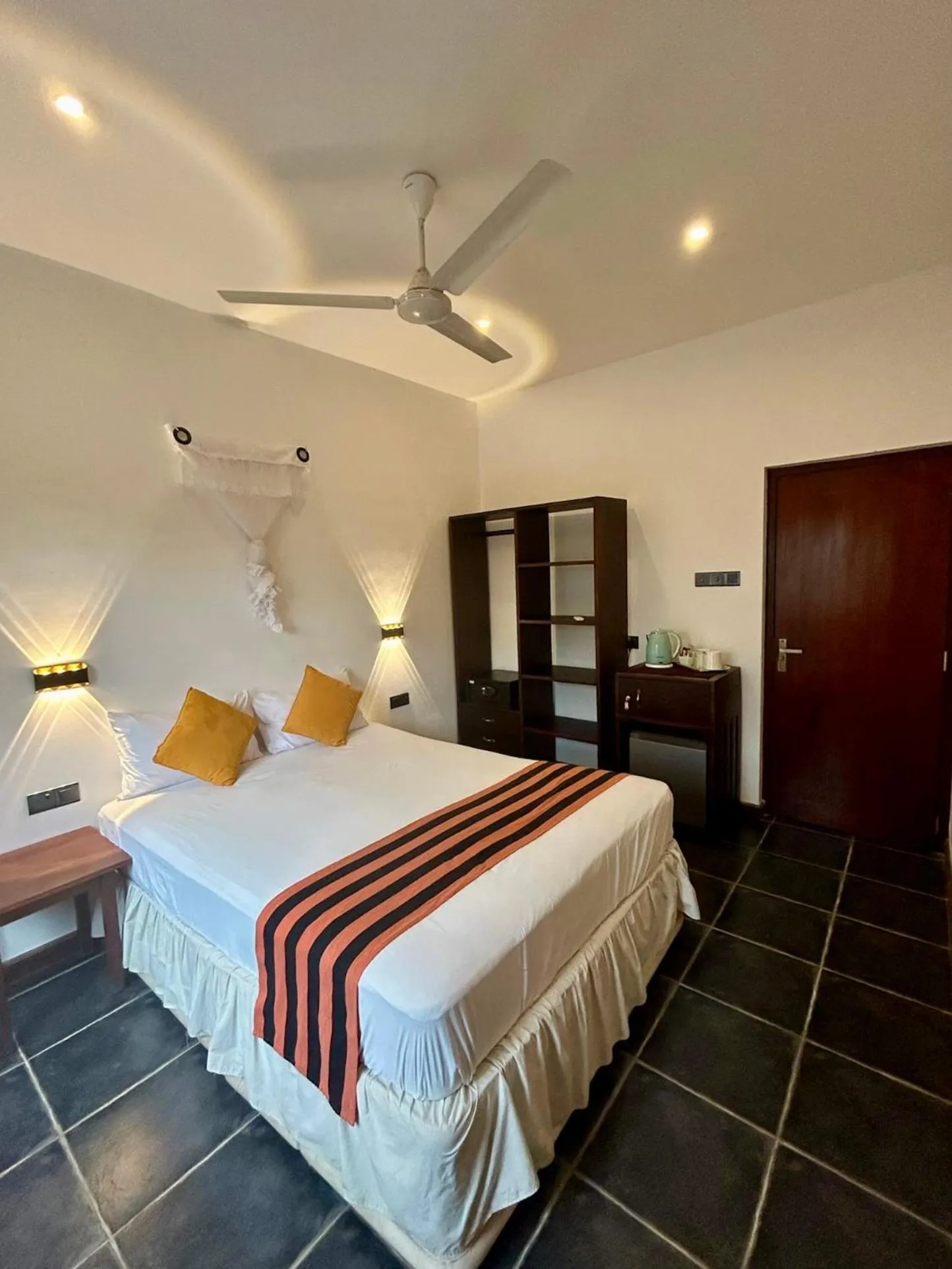 Bed in Reef Bungalow Hotel