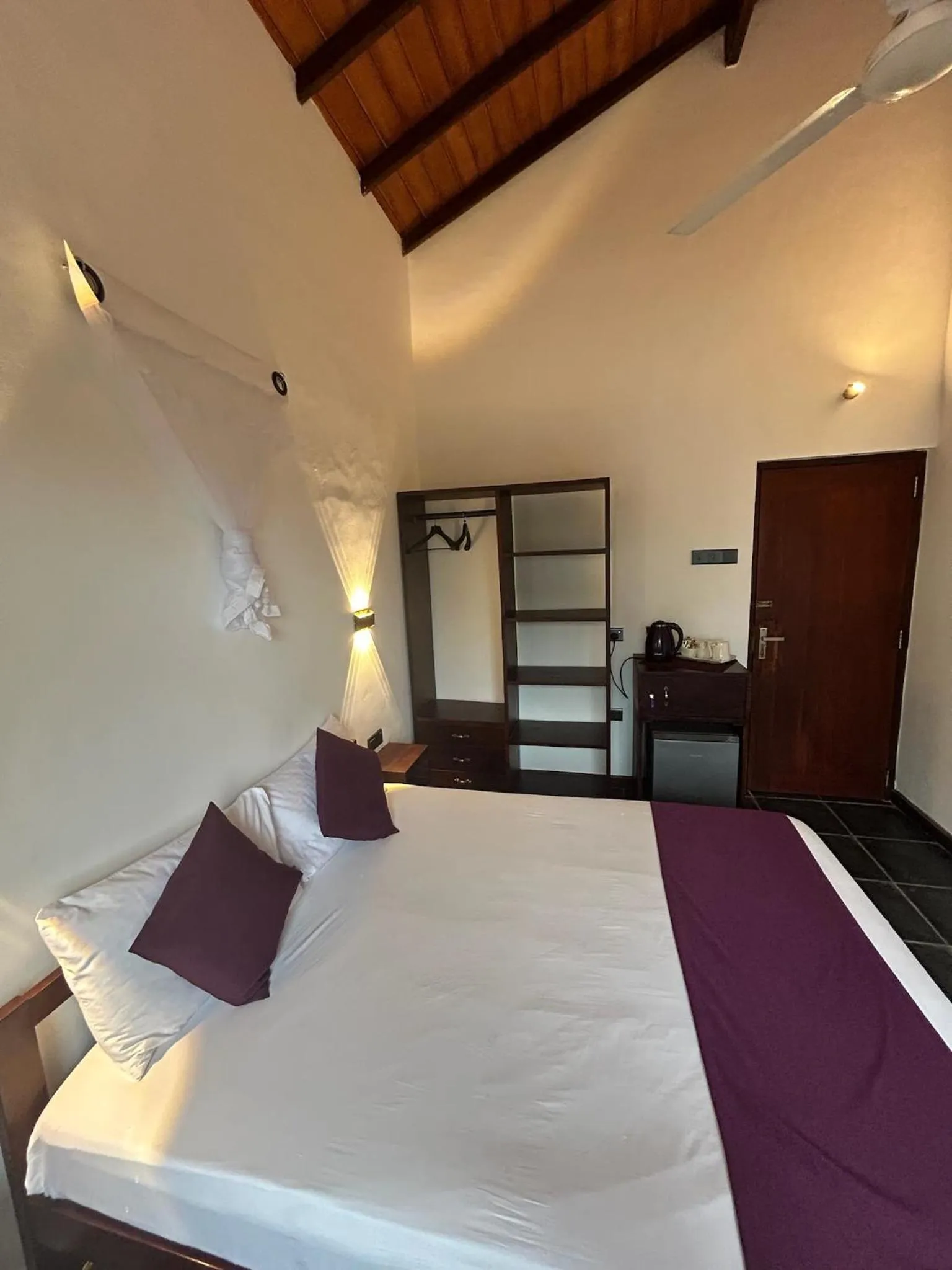 Bed in Reef Bungalow Hotel