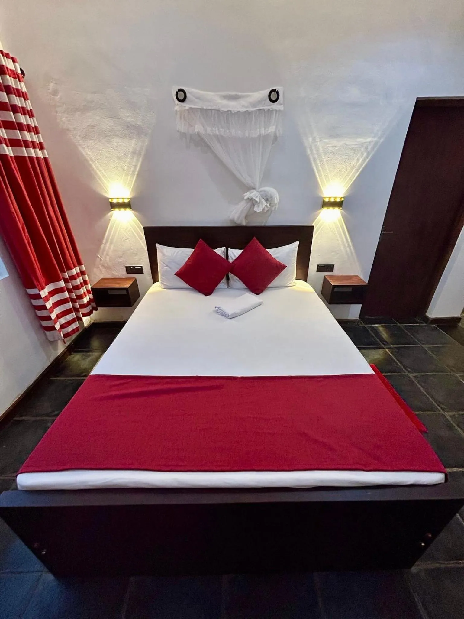 Bed in Reef Bungalow Hotel