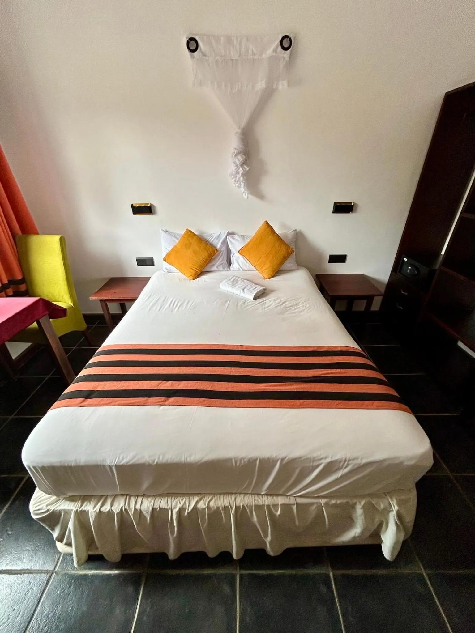 Bed in Reef Bungalow Hotel