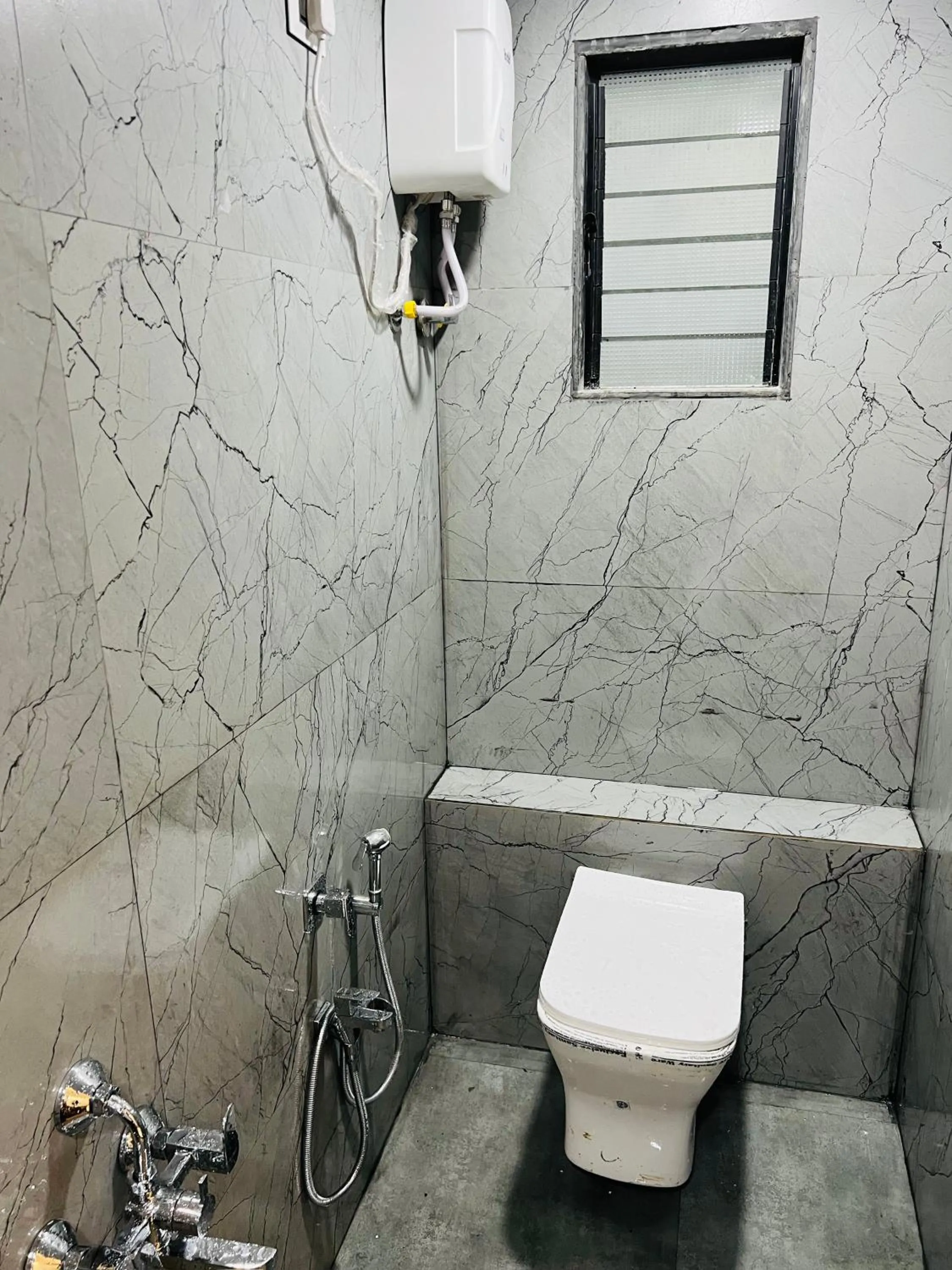 Bathroom in Hotel New City Light