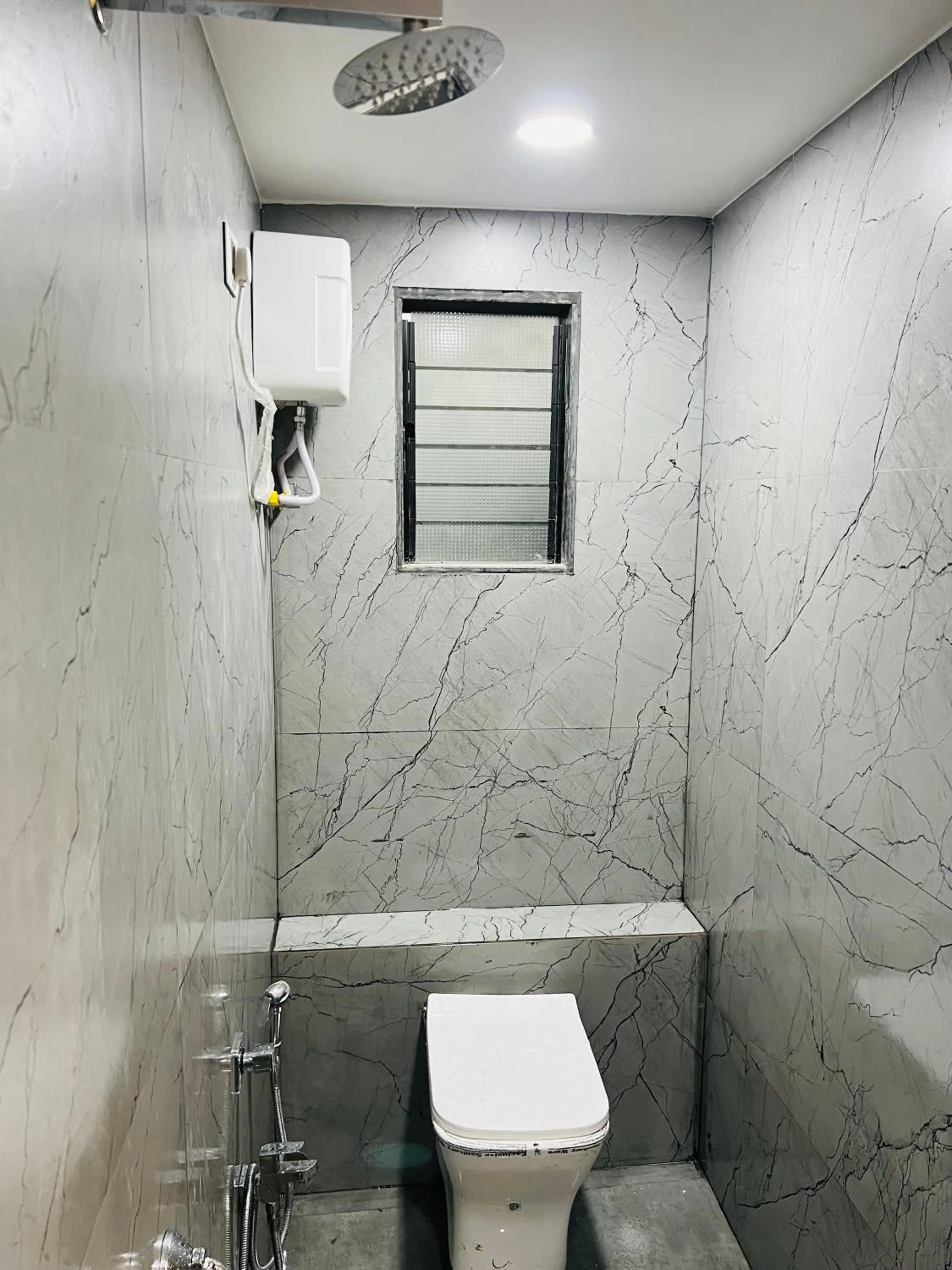 Toilet in Hotel New City Light