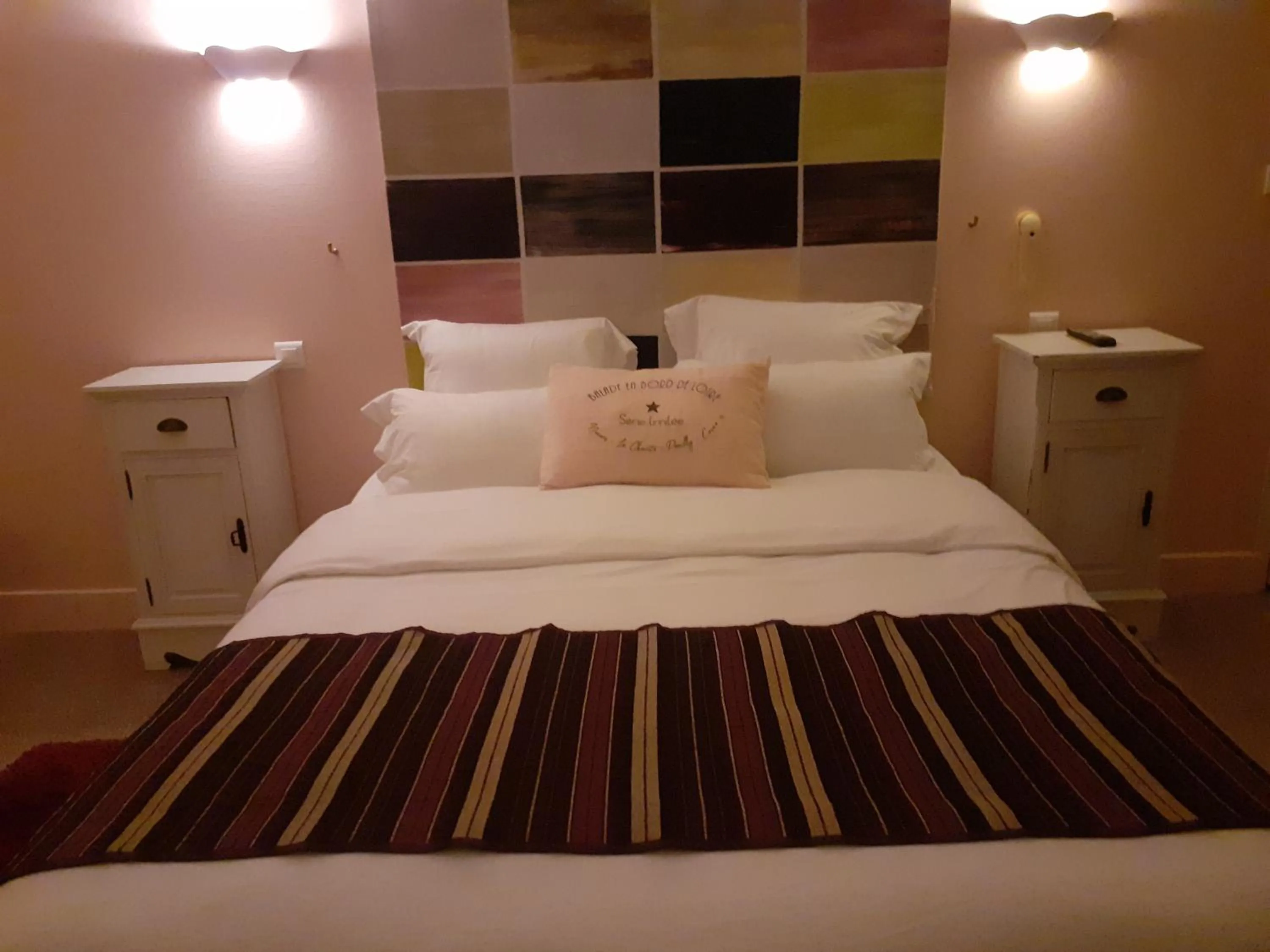 Bed in Le Grand Monarque Donzy