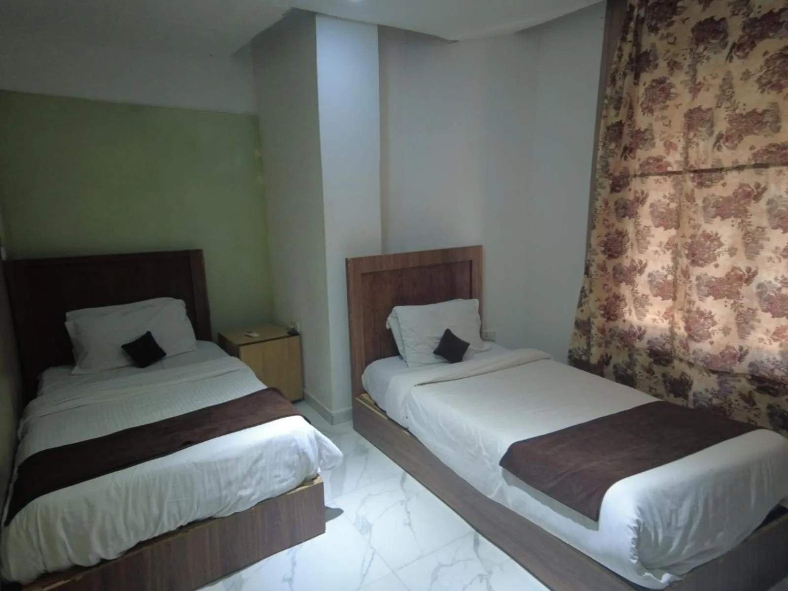 Bed in Gardenia Hotel