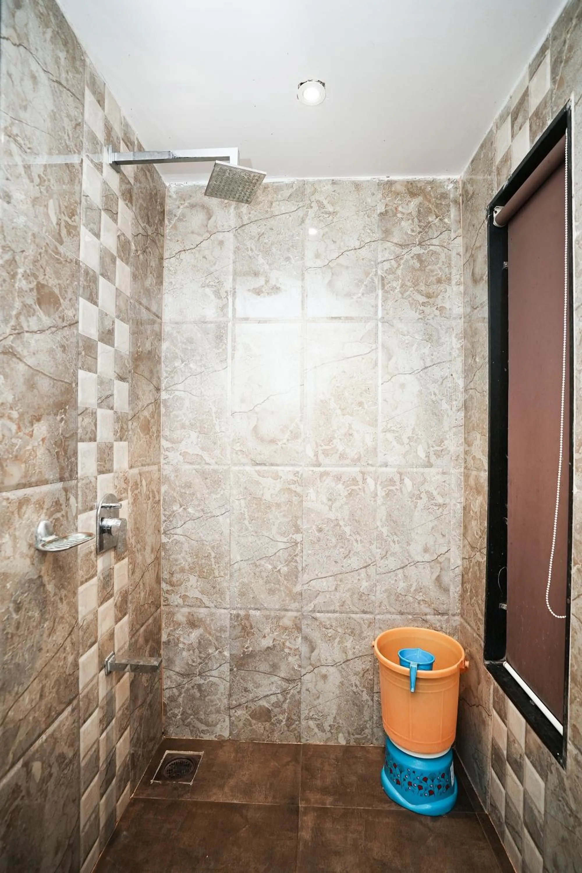 Bathroom in Dwarka Lawns Cottages