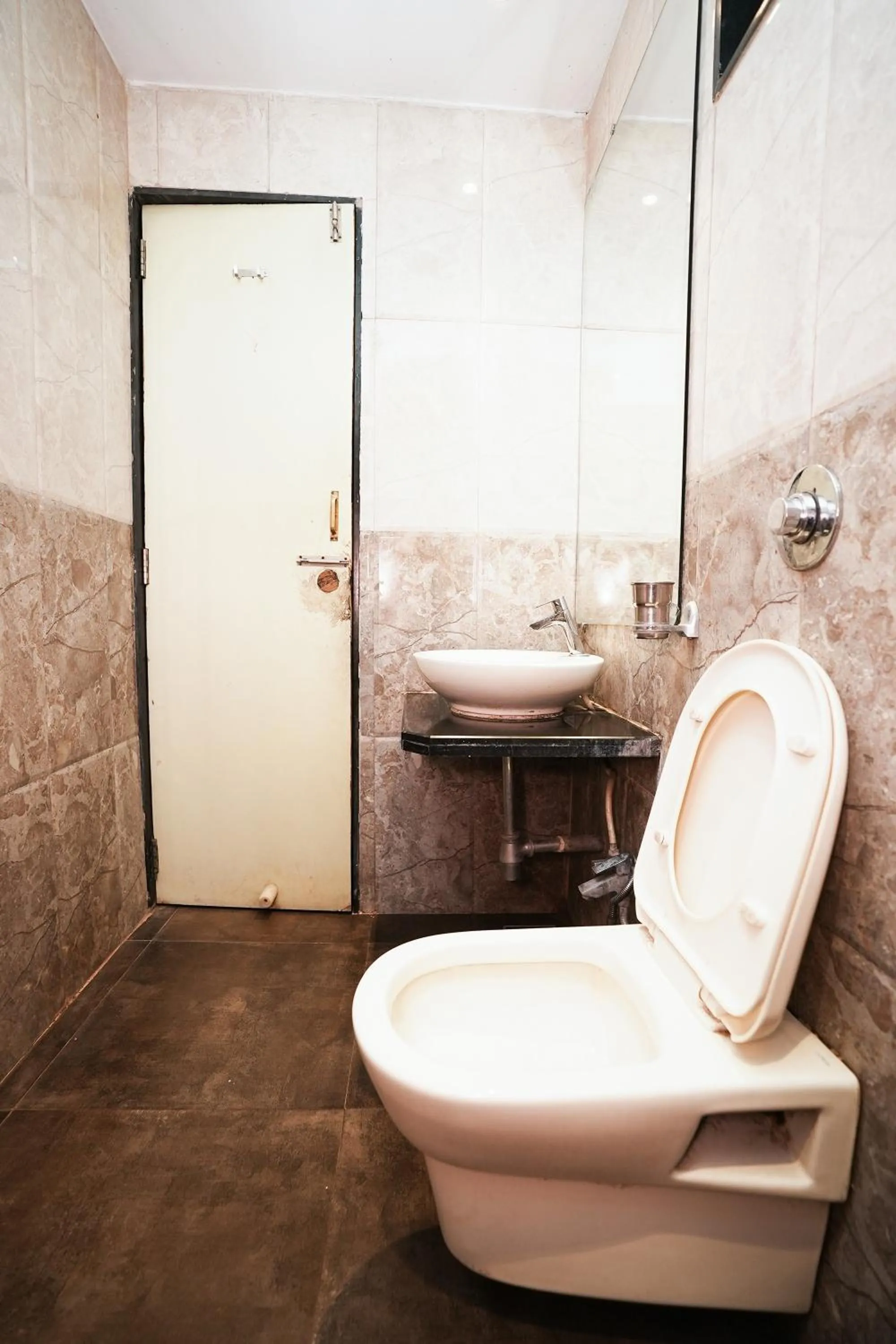 Bathroom in Dwarka Lawns Cottages