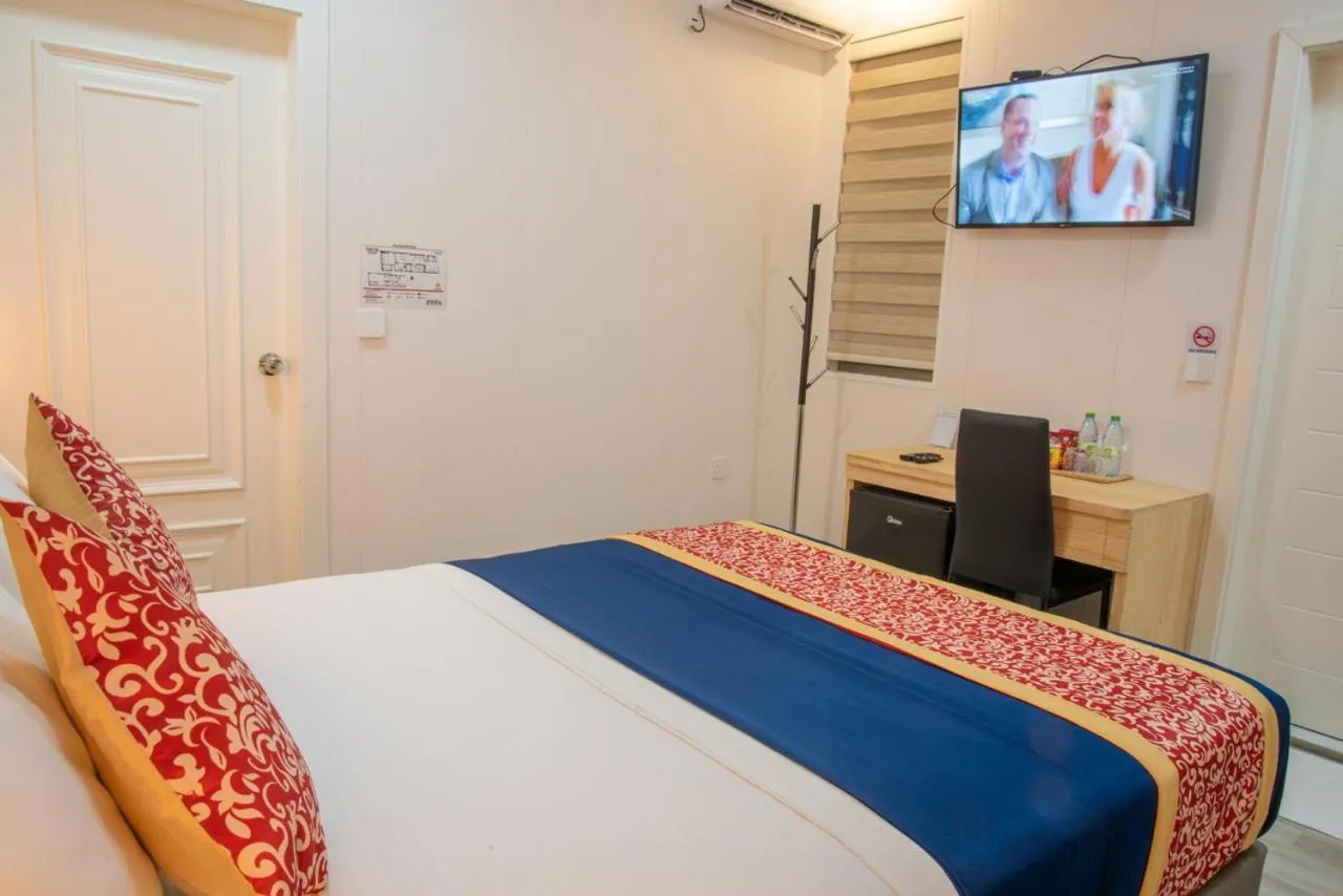 Bed in Tourist Inn Grand