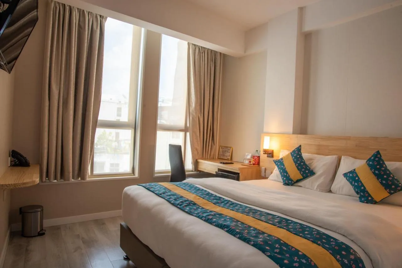 Bed in Tourist Inn Grand