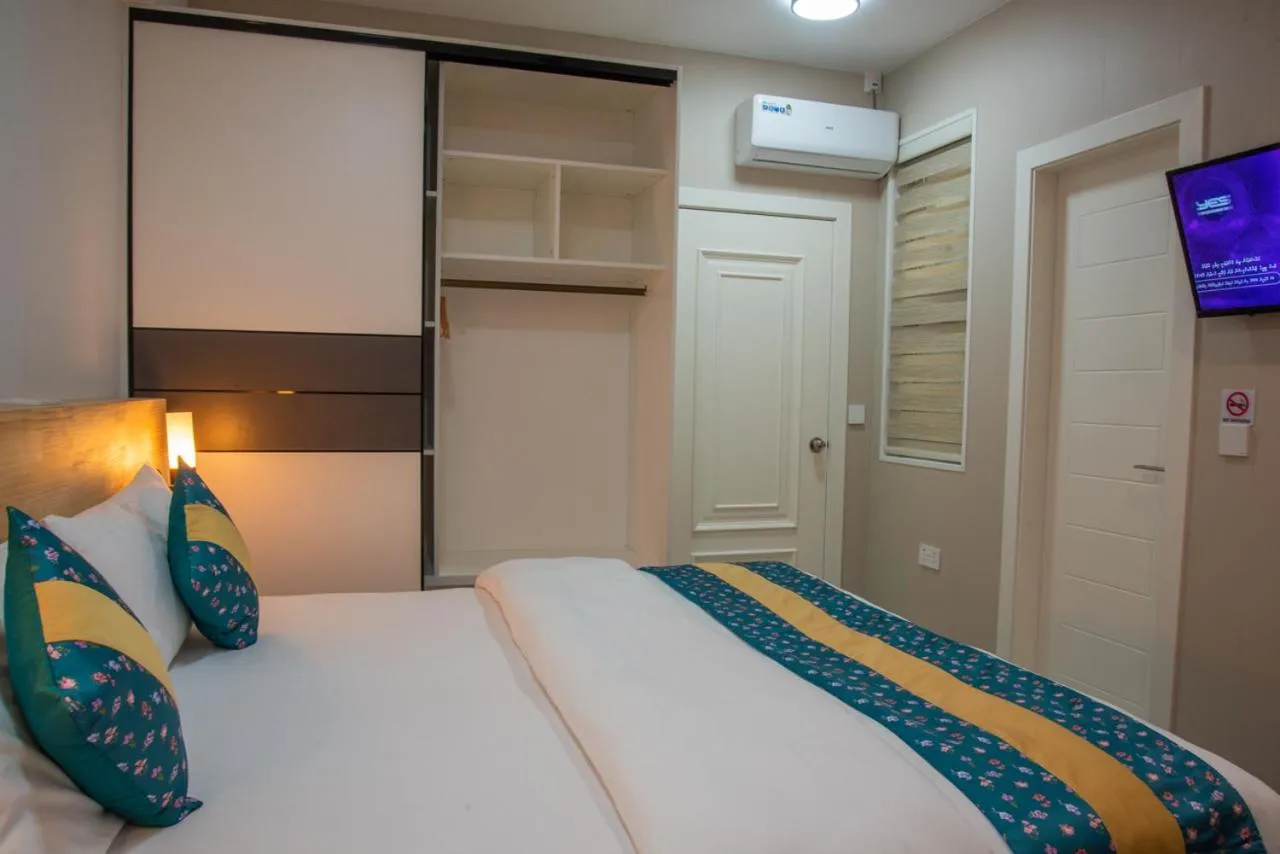 Bed in Tourist Inn Grand