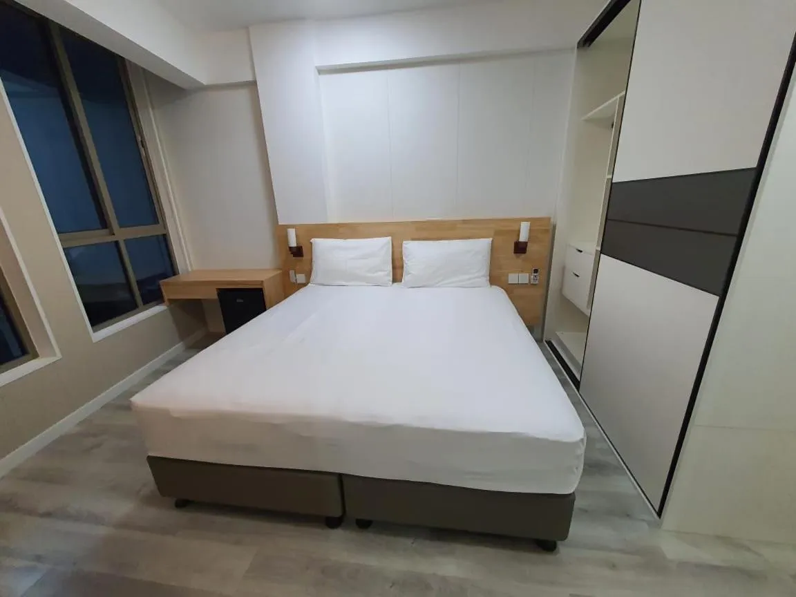 Bed in Tourist Inn Grand