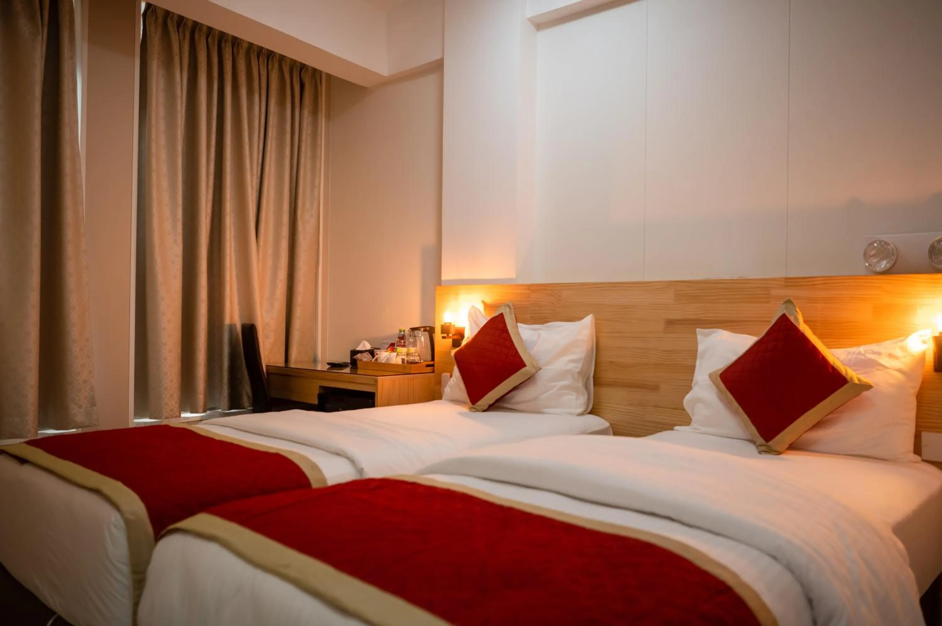 Bed in Tourist Inn Grand