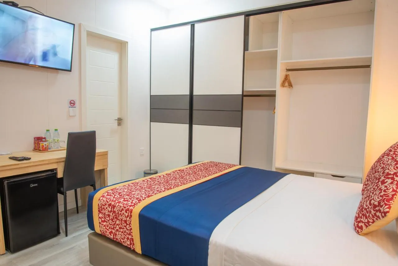 Bed in Tourist Inn Grand