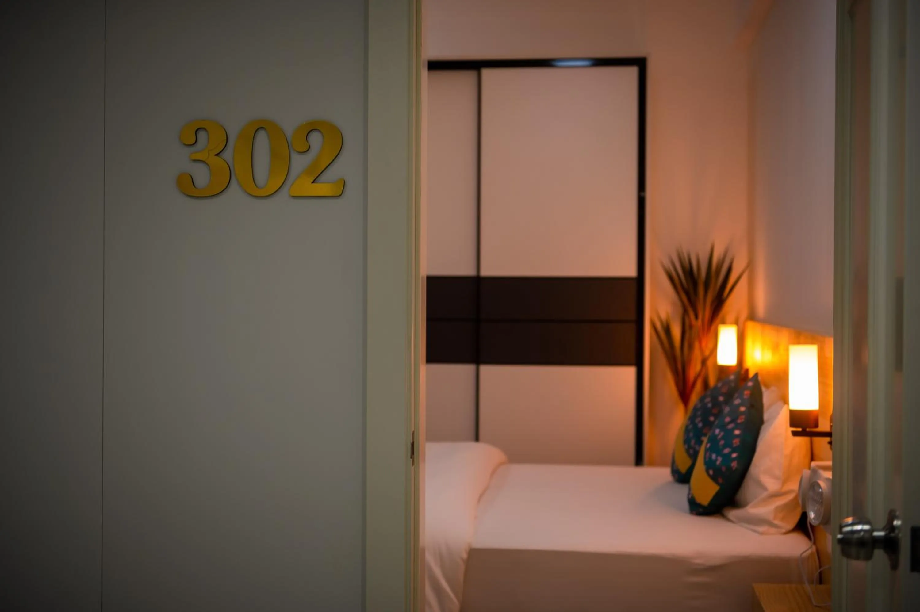 Bed in Tourist Inn Grand