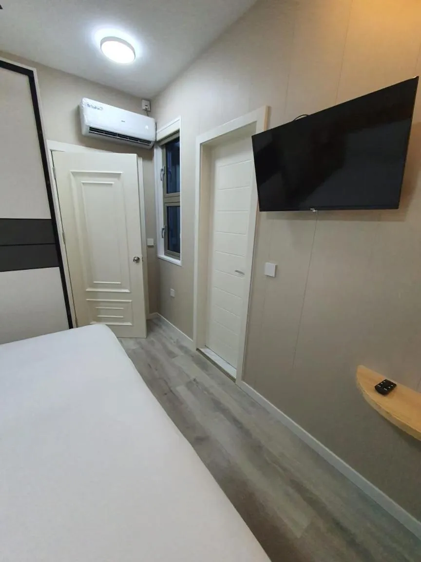 Bed in Tourist Inn Grand