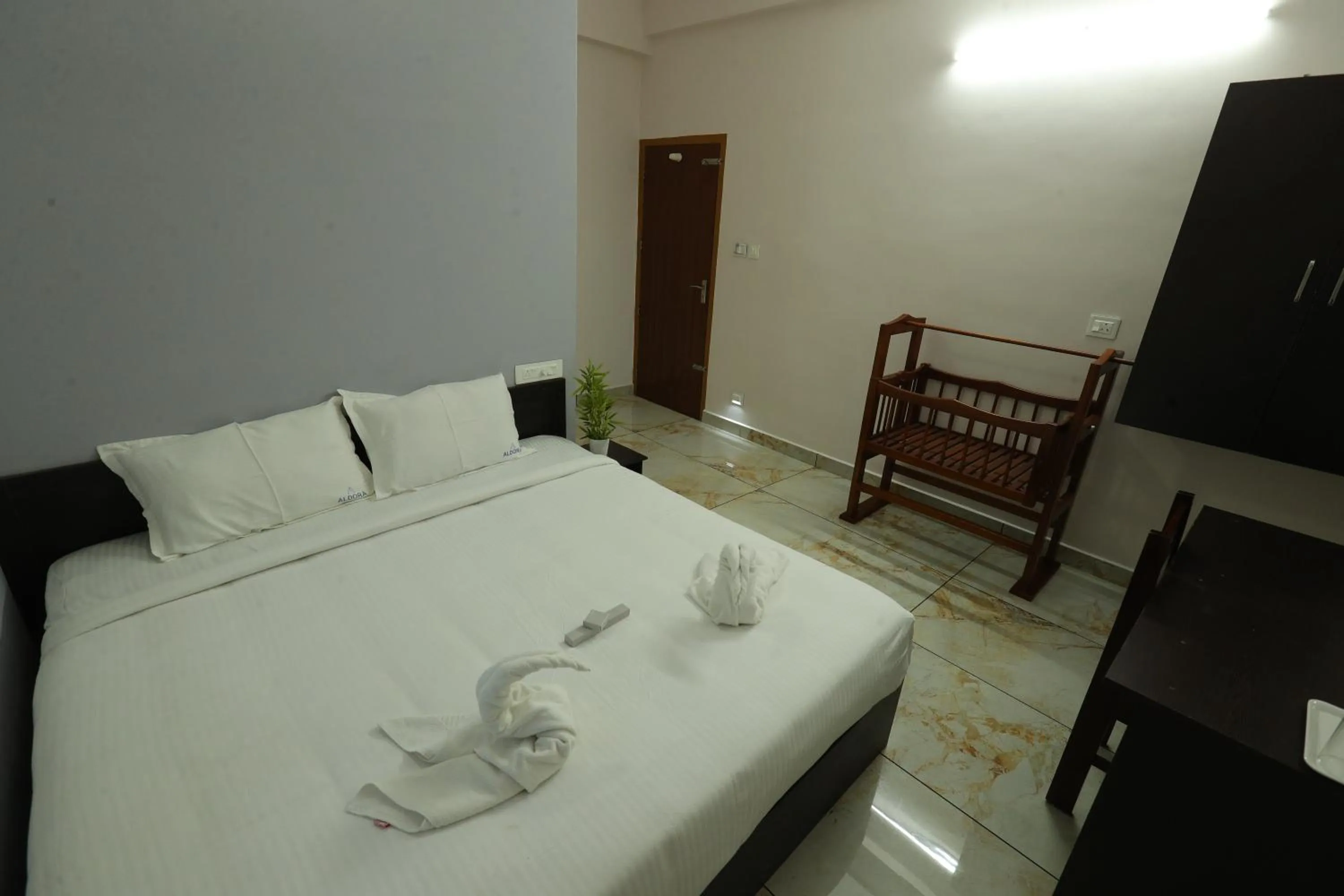 Bed in Aldora Airport Residency