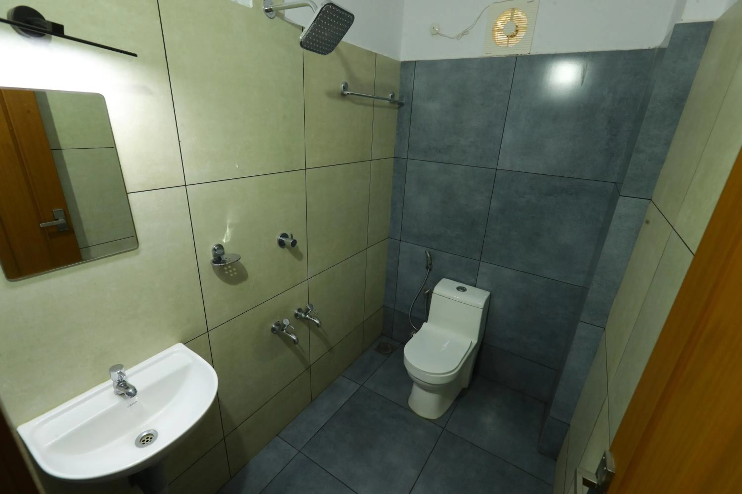 Bathroom in Aldora Airport Residency