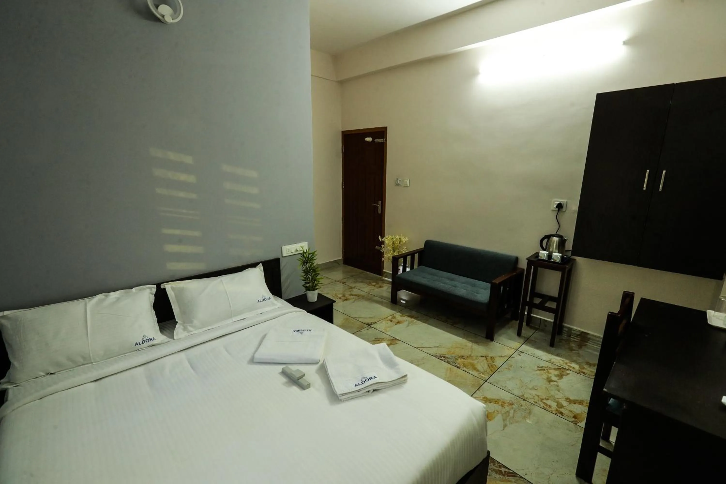 Bed in Aldora Airport Residency