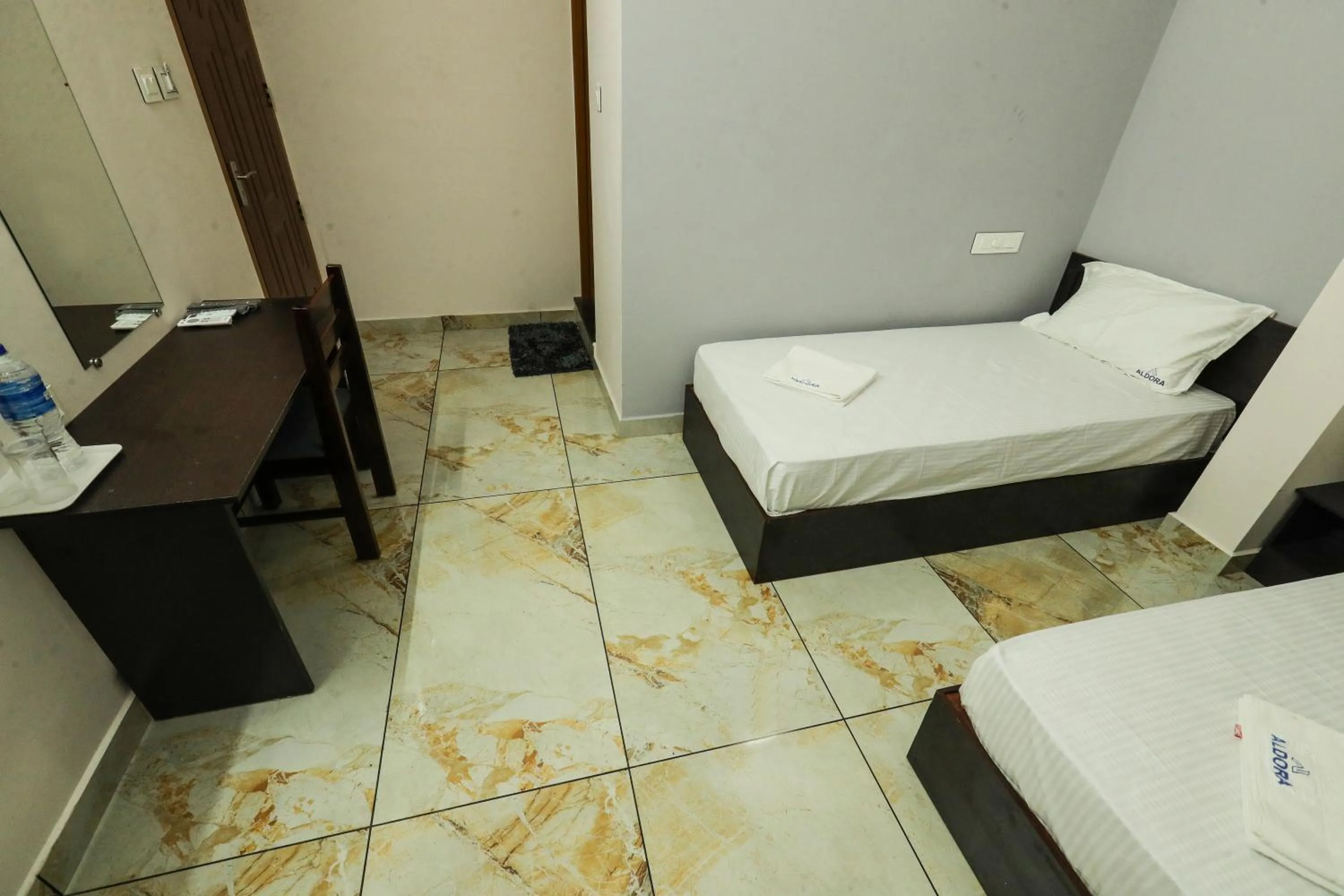 Bed in Aldora Airport Residency