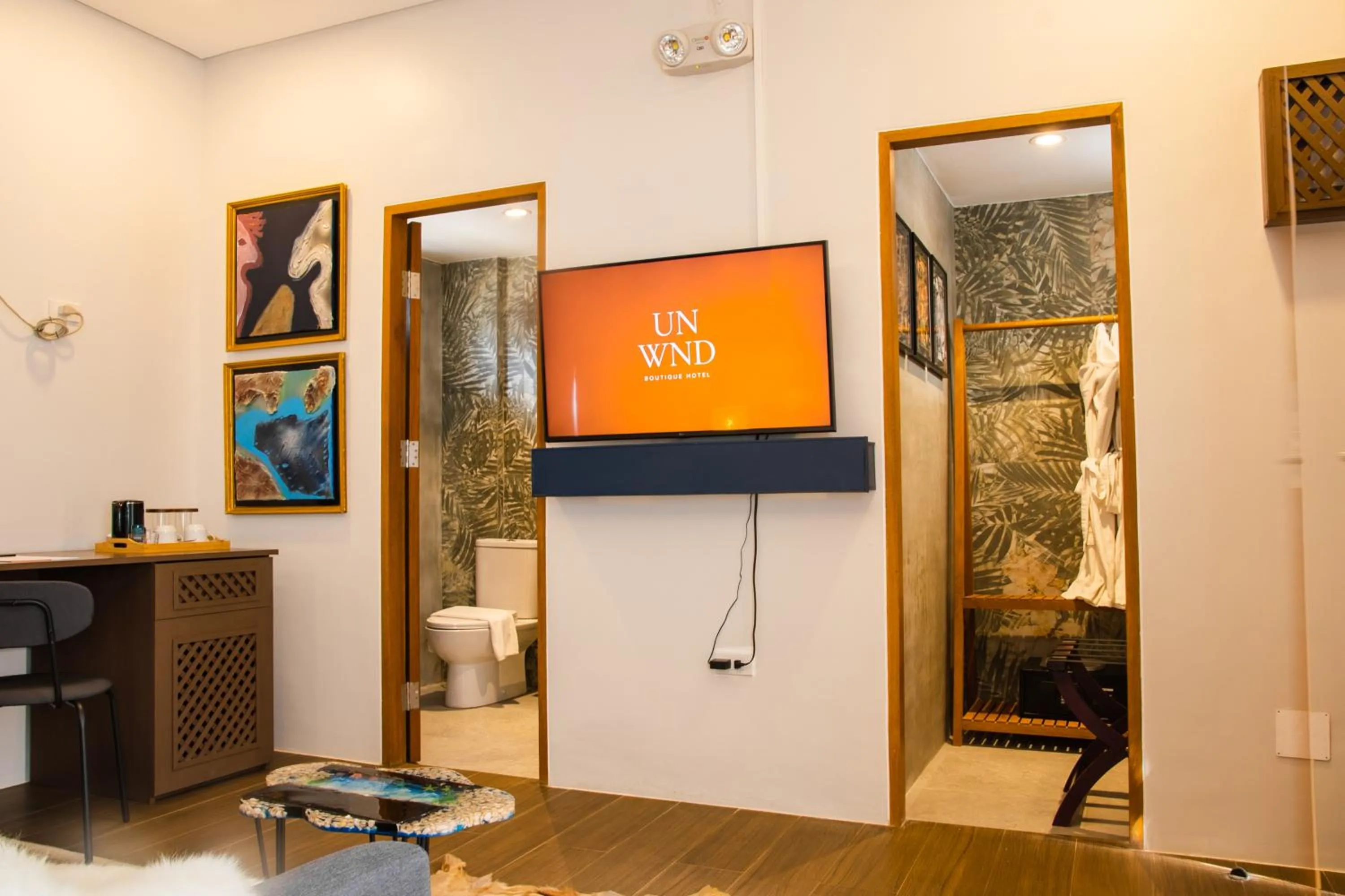 TV and multimedia in UNWND Boutique Hotel Calatagan