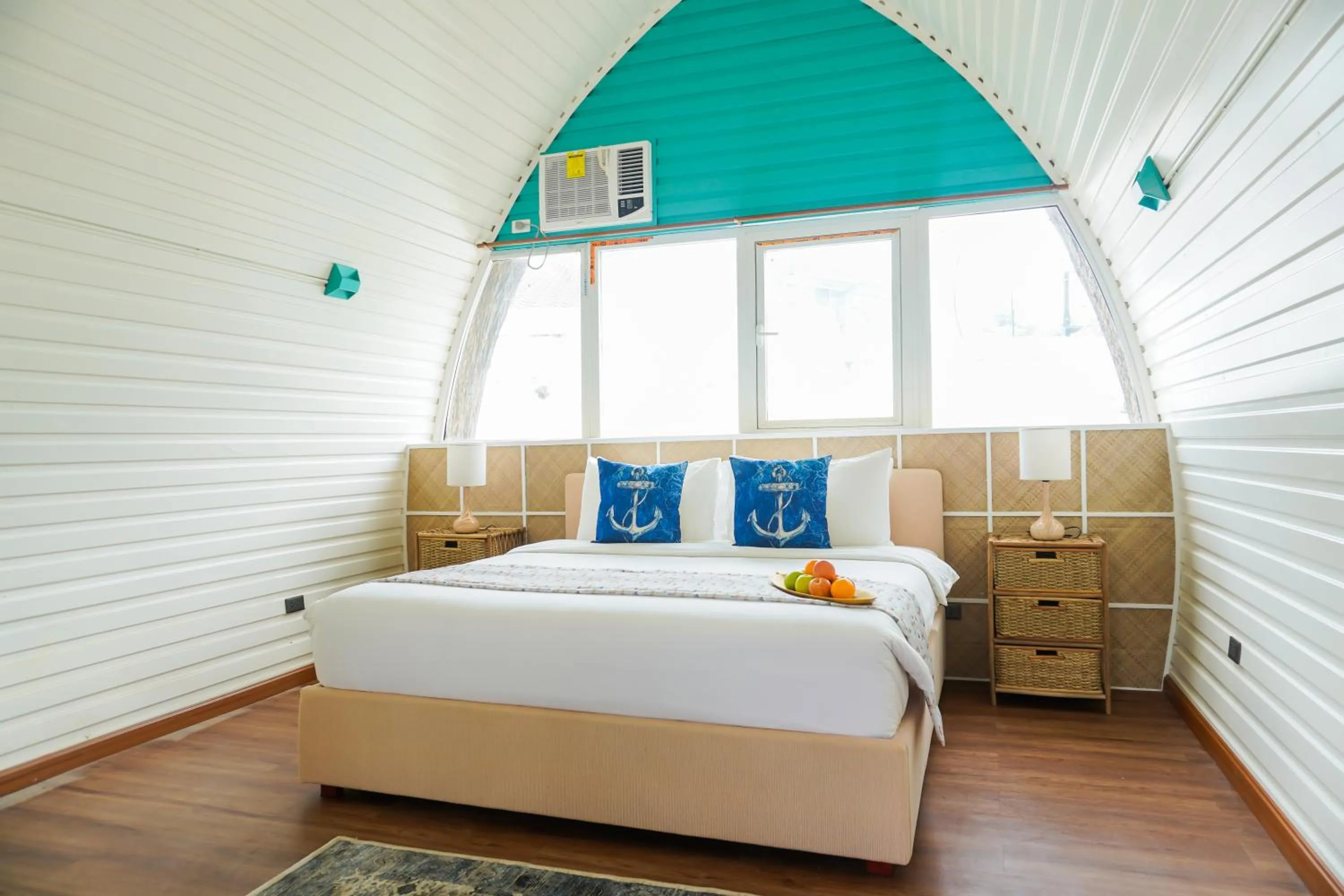 Bed in UNWND Boutique Hotel Calatagan