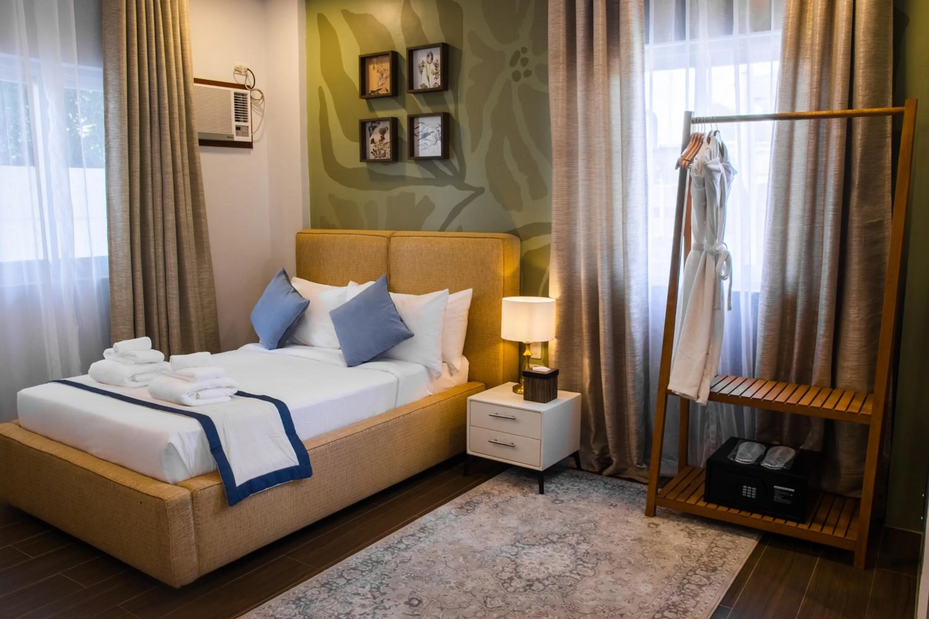 Photo of the whole room, Bed in UNWND Boutique Hotel Calatagan