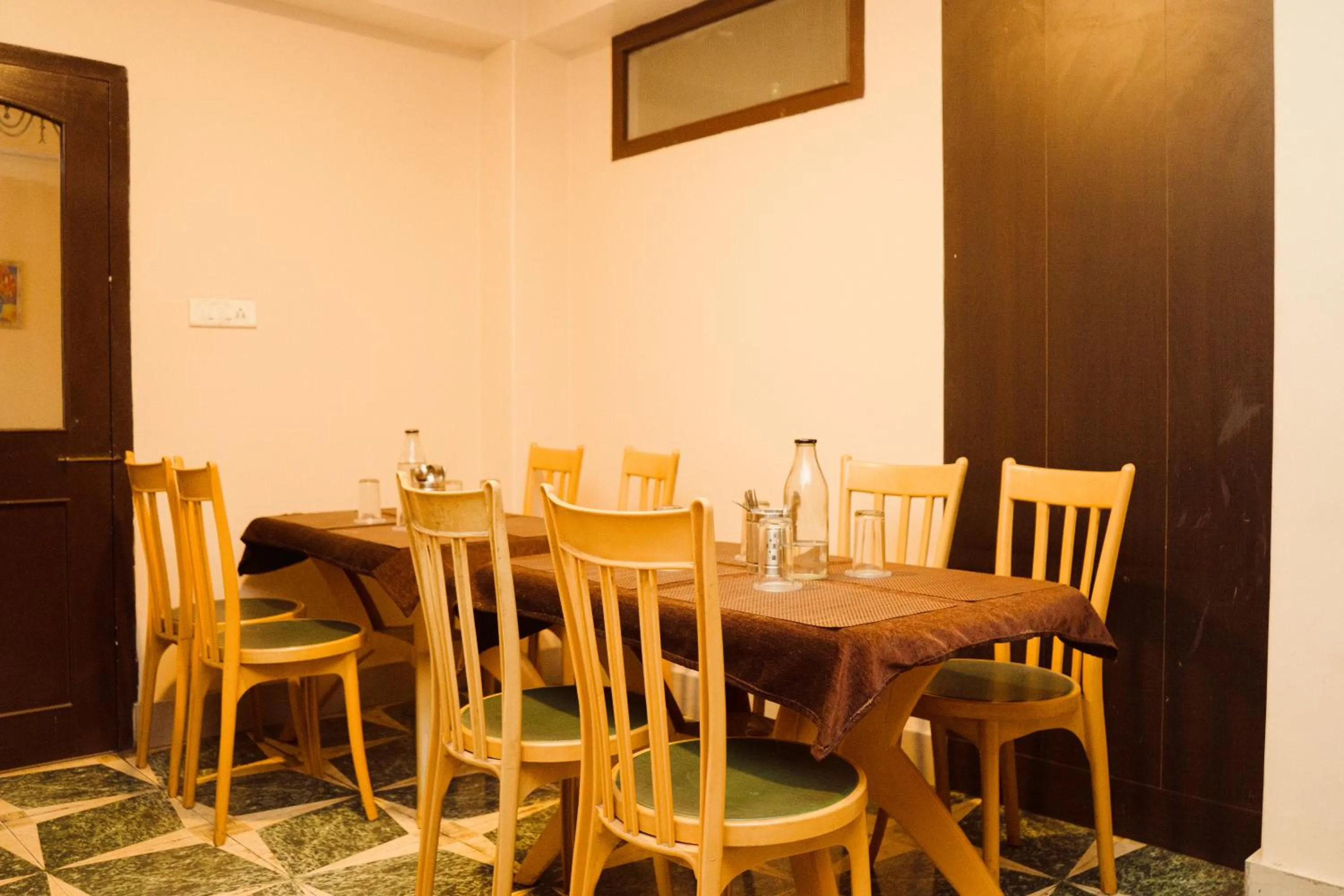 Dining area in Hotel Siddhi Vinayak Regency, Mg Marg