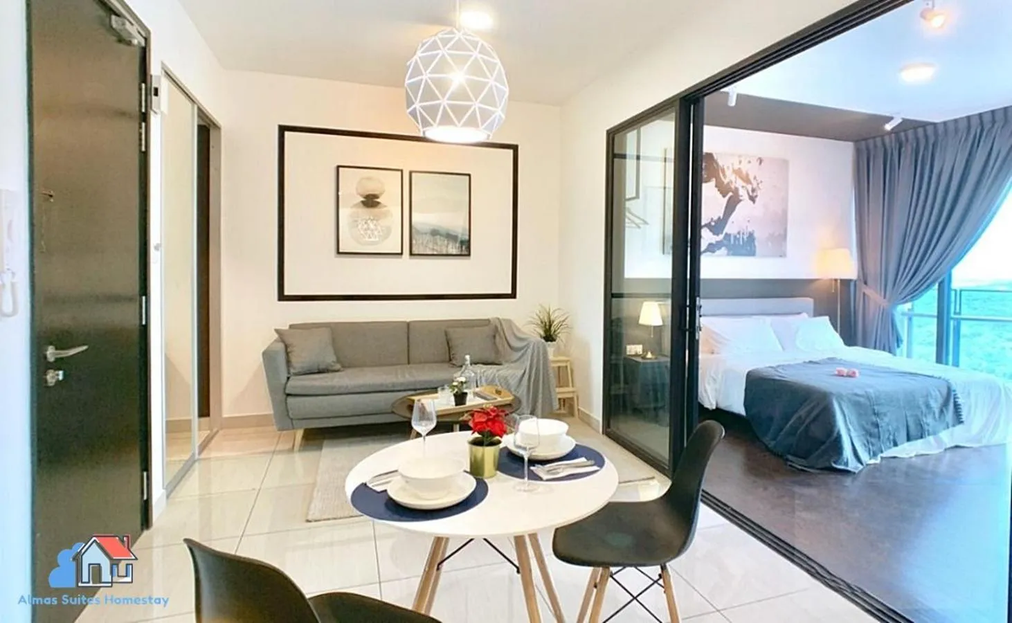 Living room, Bed in Almas Suites @ Puteri Harbour