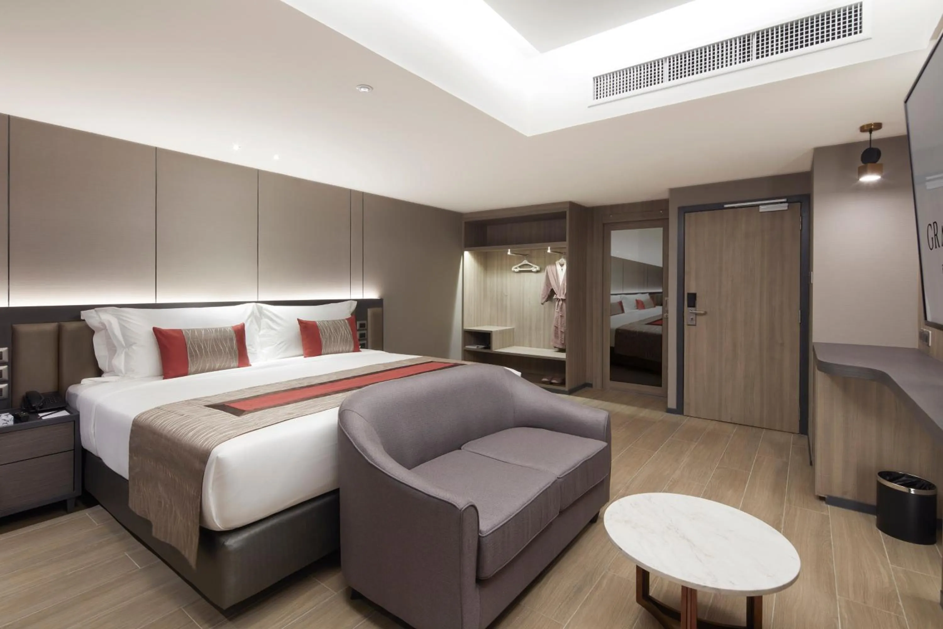 Bed in Grace At Five by Grace Hotel Bangkok