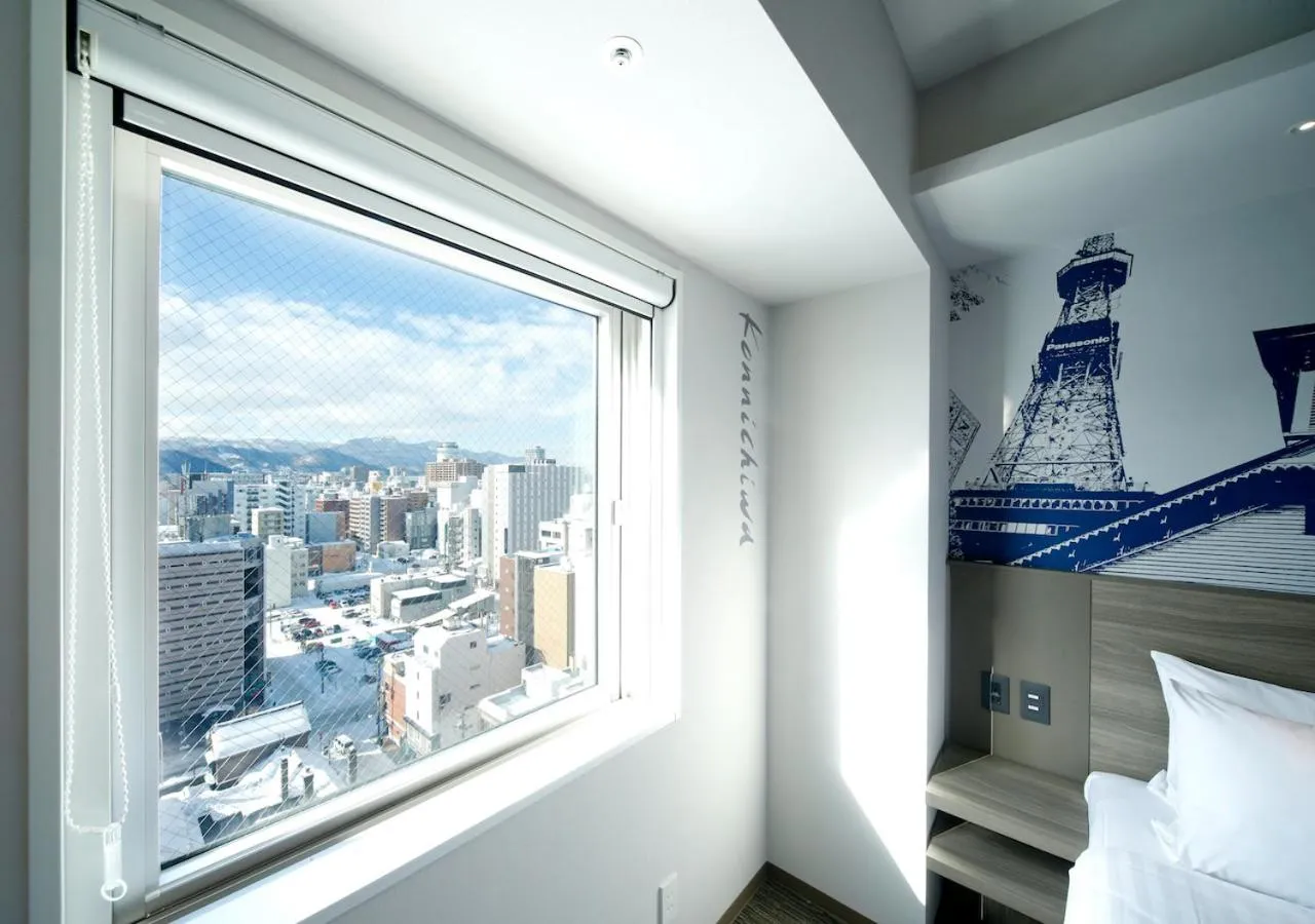 View (from property/room), Bed in Travelodge Sapporo Susukino