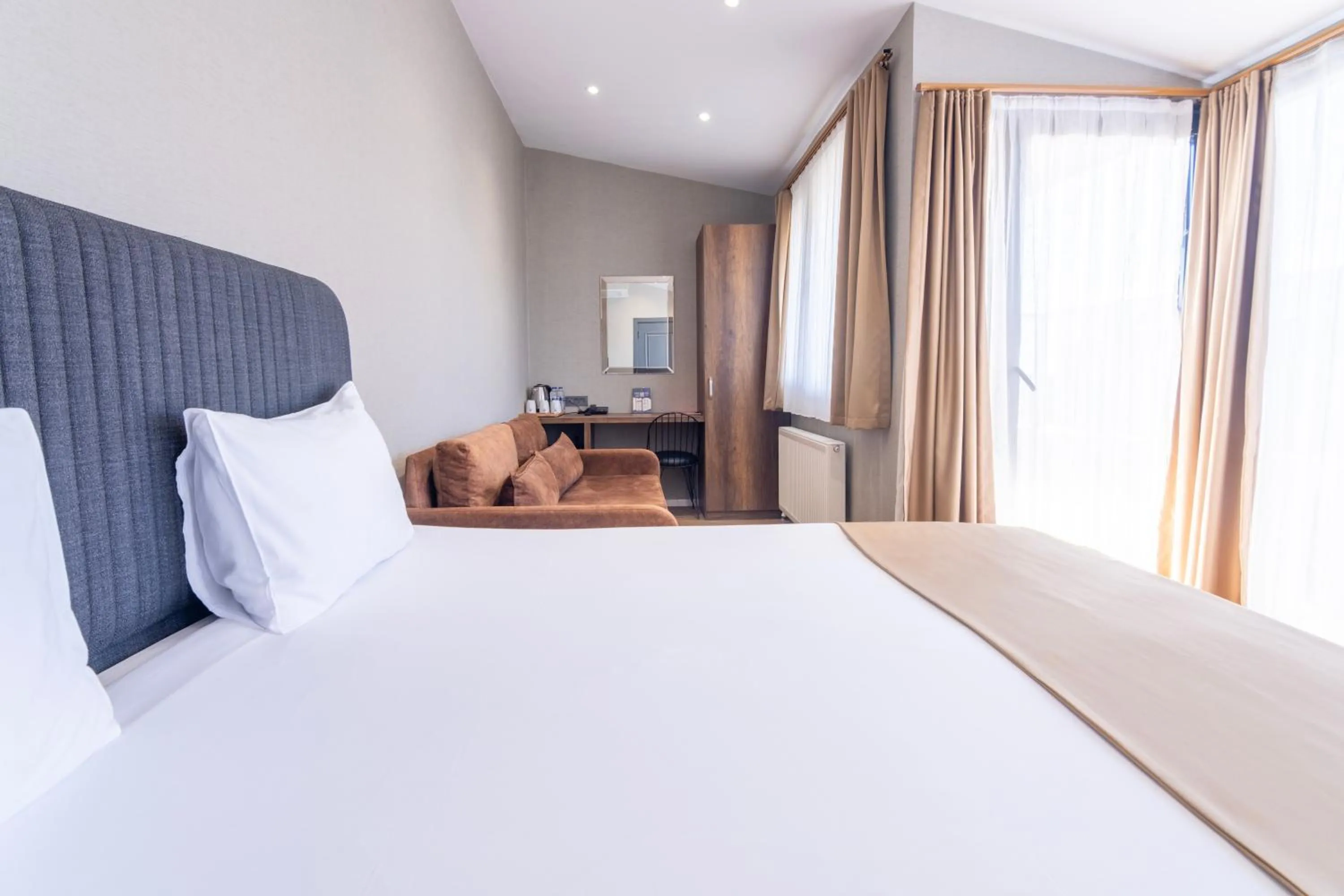 Bed in The Omiya Hotel