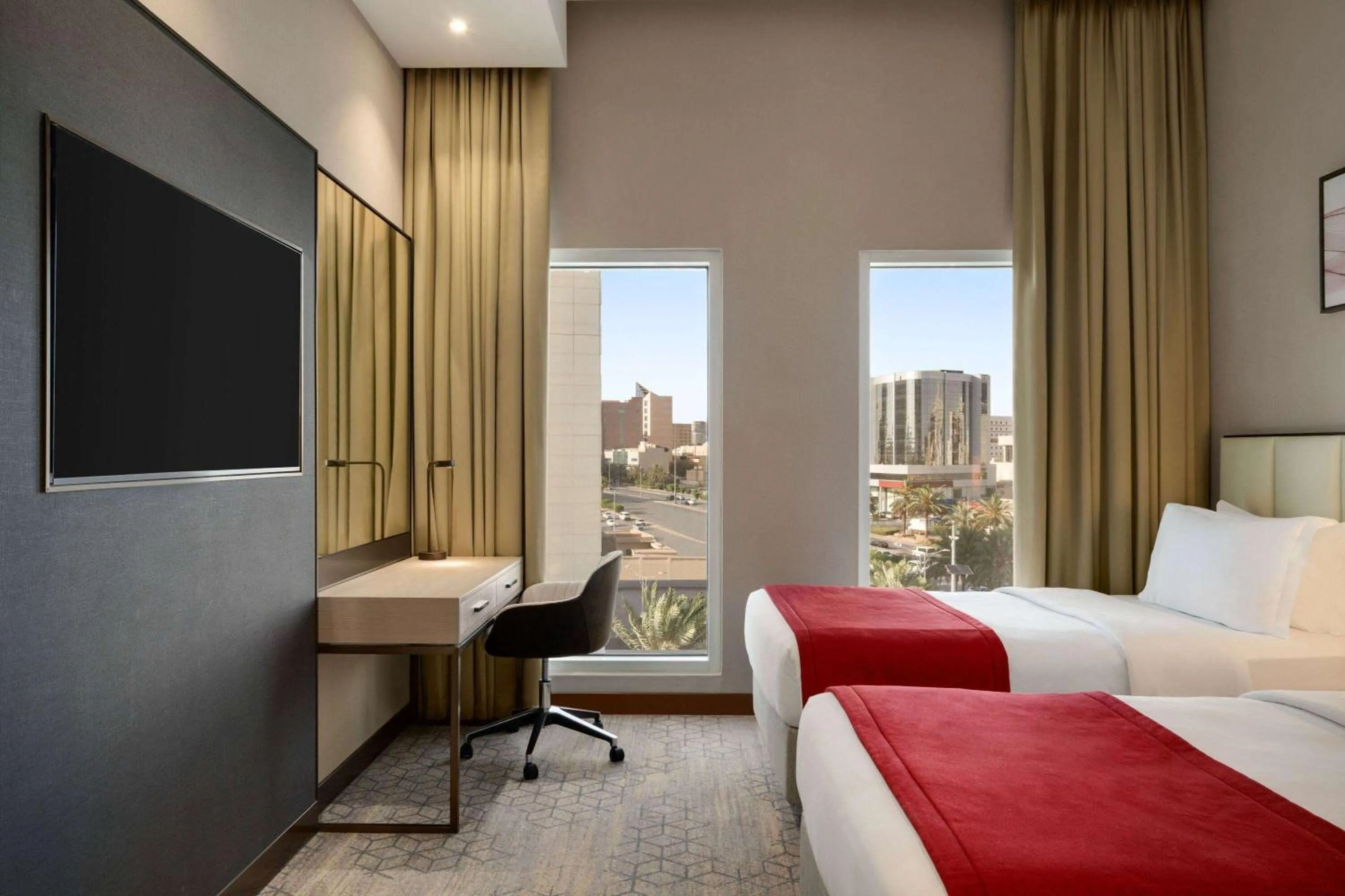 Photo of the whole room, Bed in Ramada by Wyndham Riyadh King Fahd Road