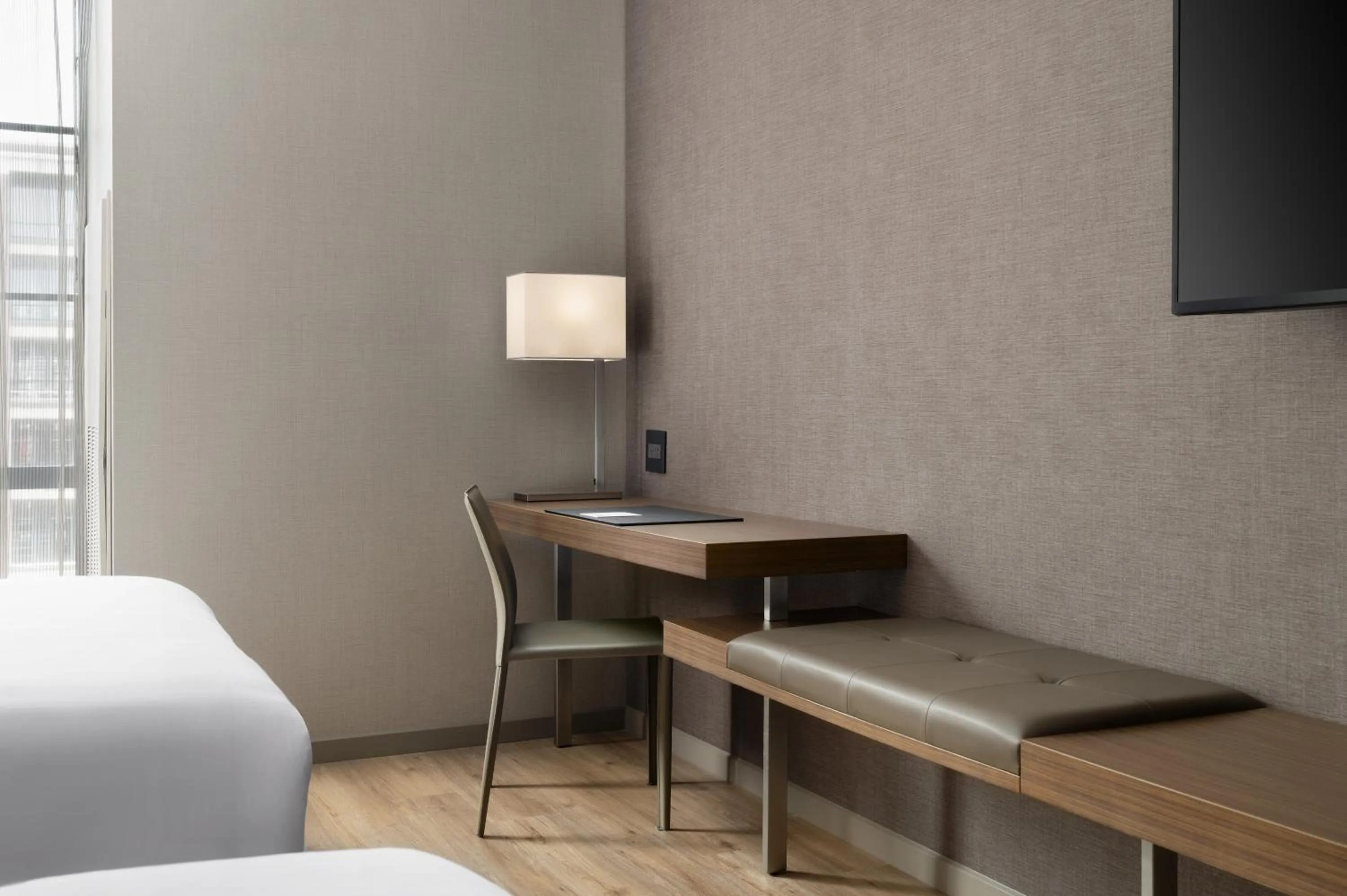 Bed in AC Hotel by Marriott Dayton