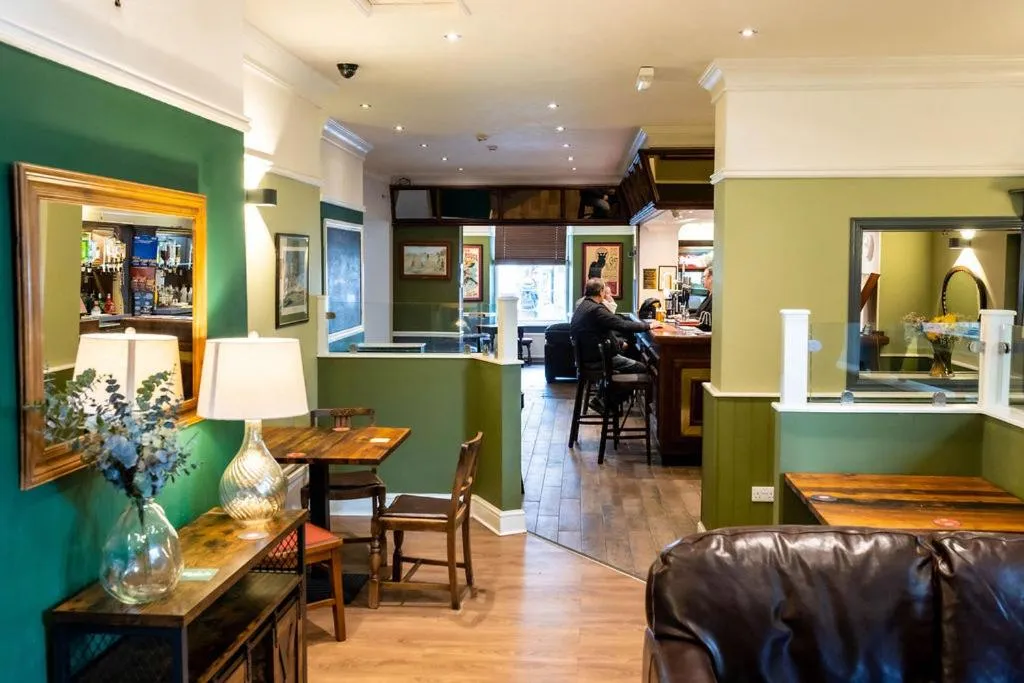 Lounge or bar in The Windmill Hotel