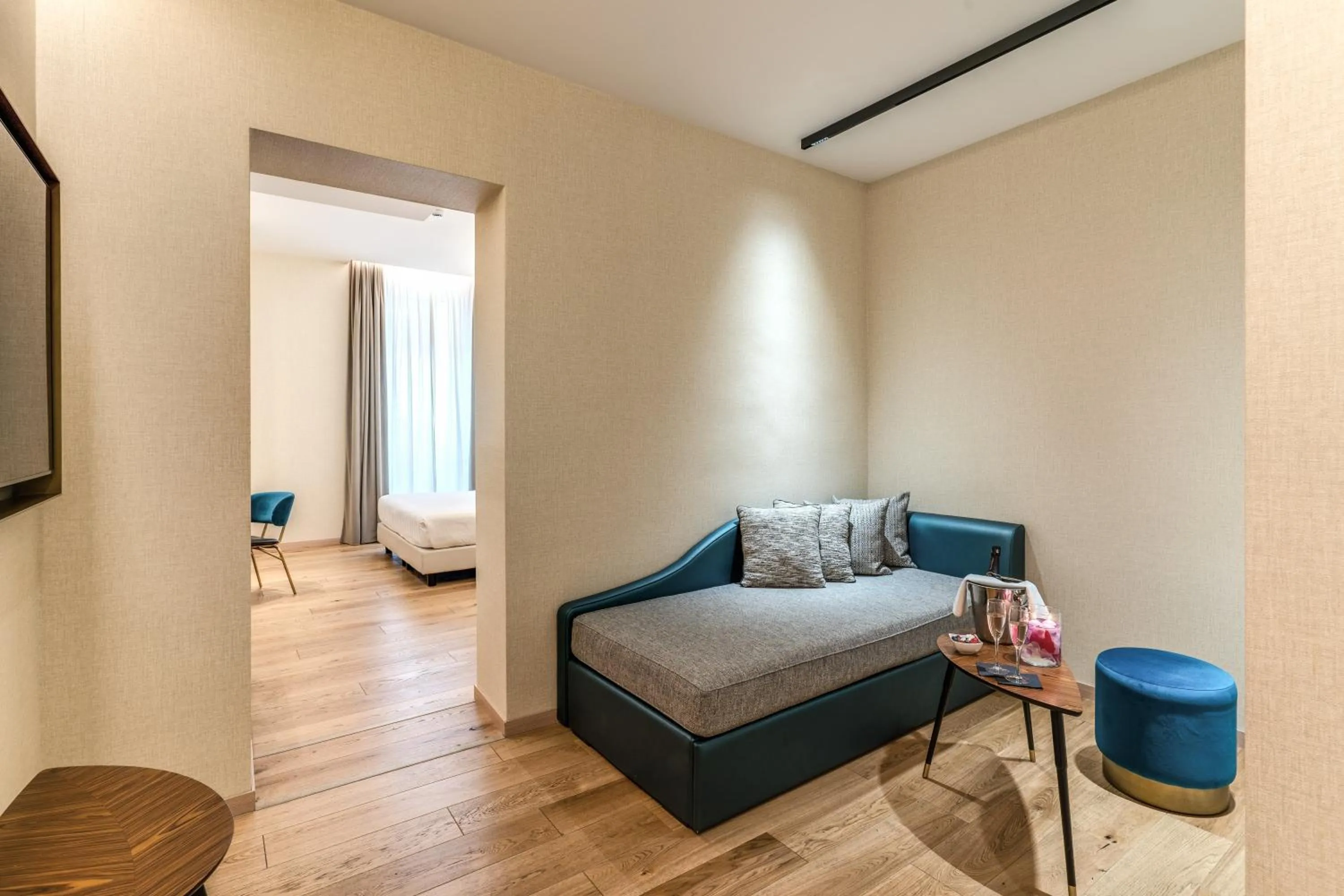 Seating area, Bed in CC Palace Hotel