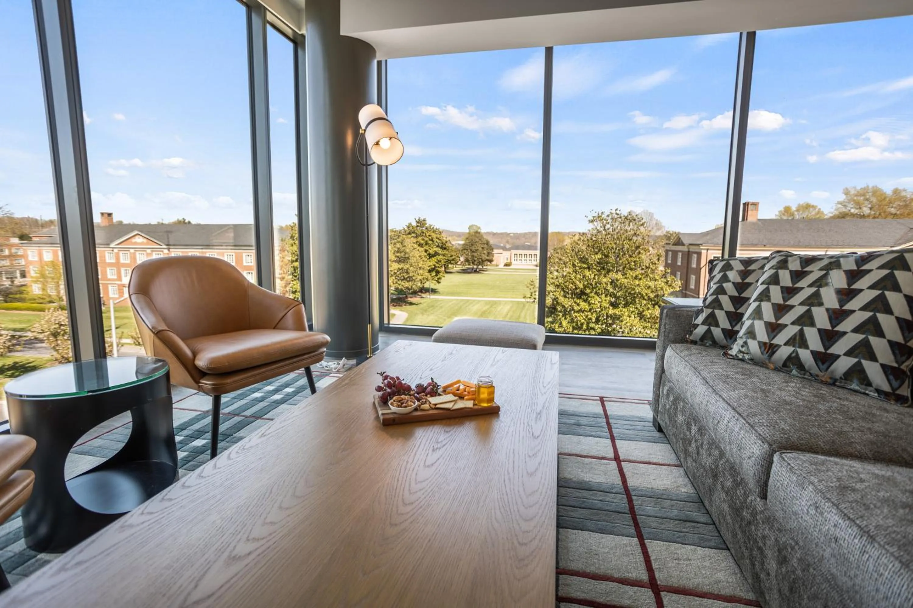 Living room in The Highlander at Radford, Tapestry Collection by Hilton