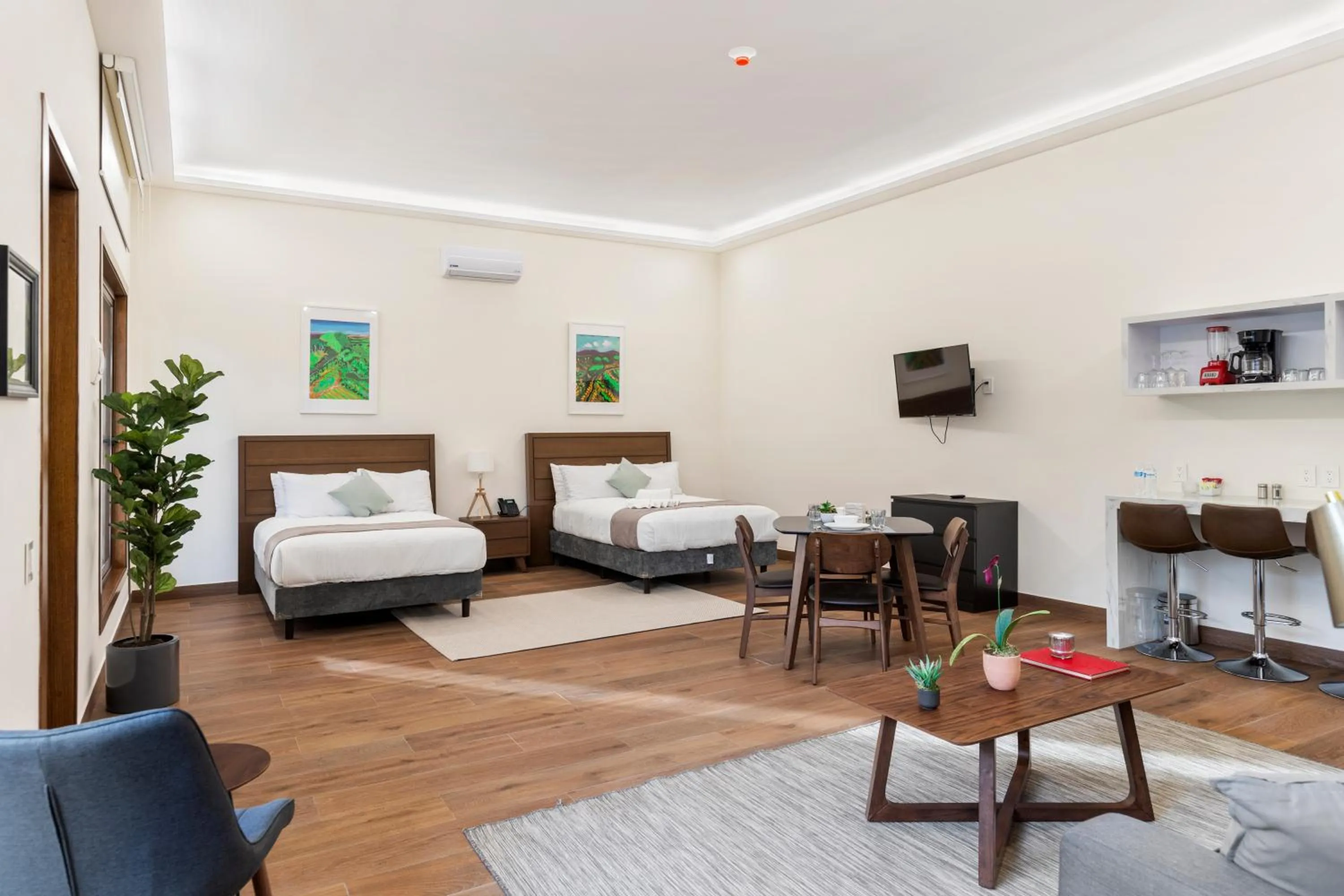 Communal lounge/ TV room, Bed in Casa Herrmann Suites