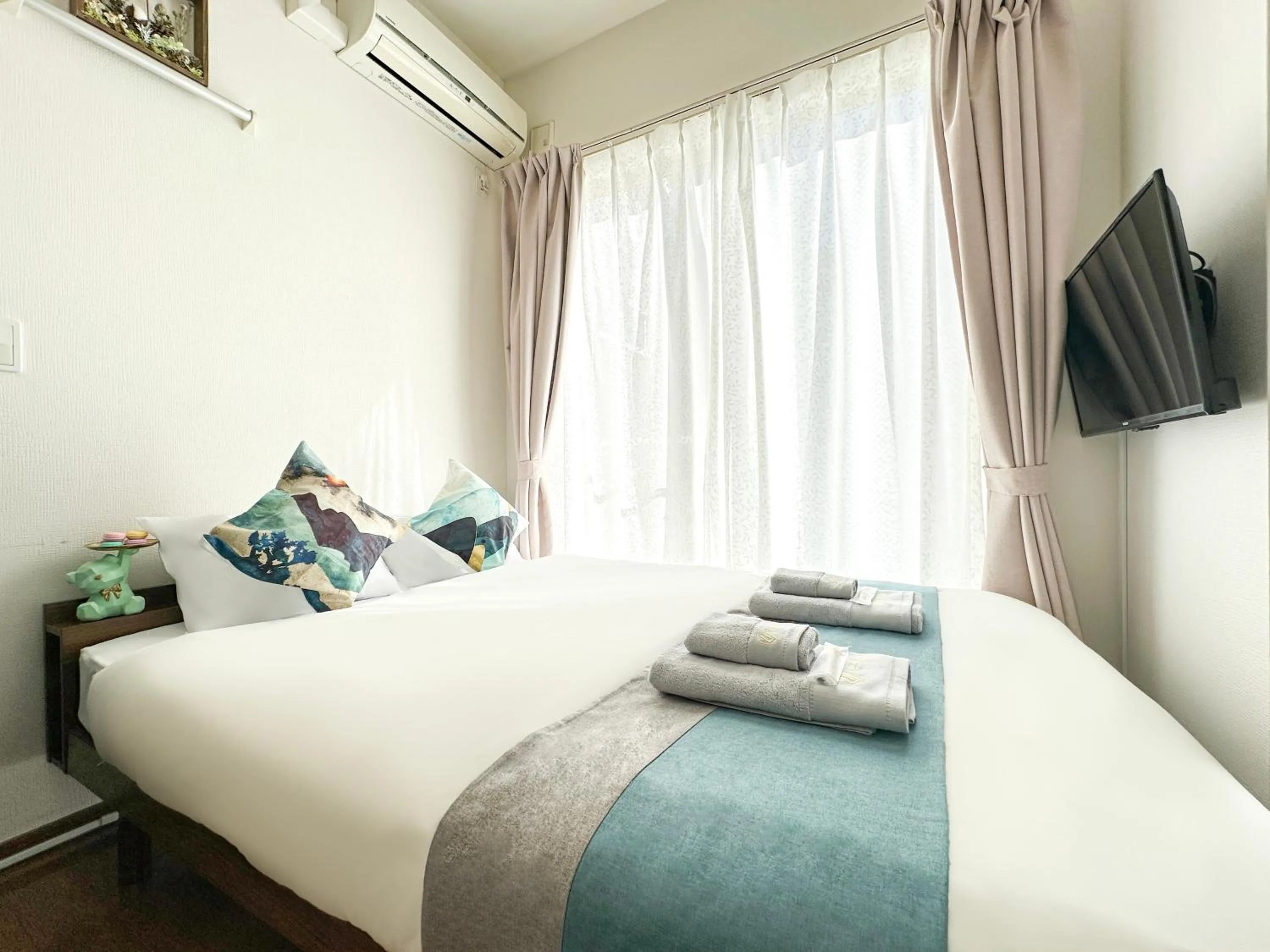 Bed in nestay suite tokyo ikebukuro