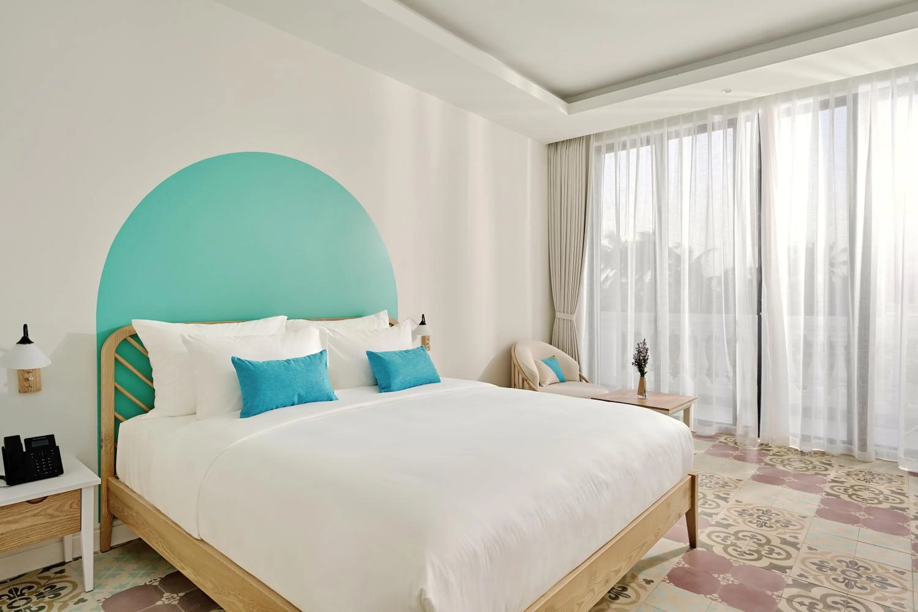 Bed in Moodhoian Riverside Resort & Spa