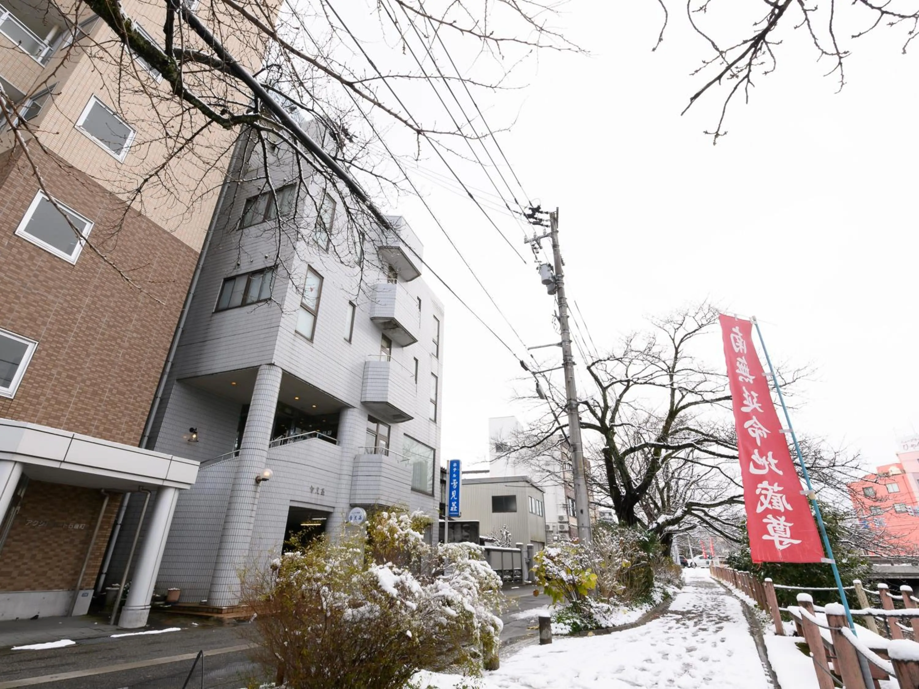 Property building in Tabist Business Ryokan Hotel Yukimiso