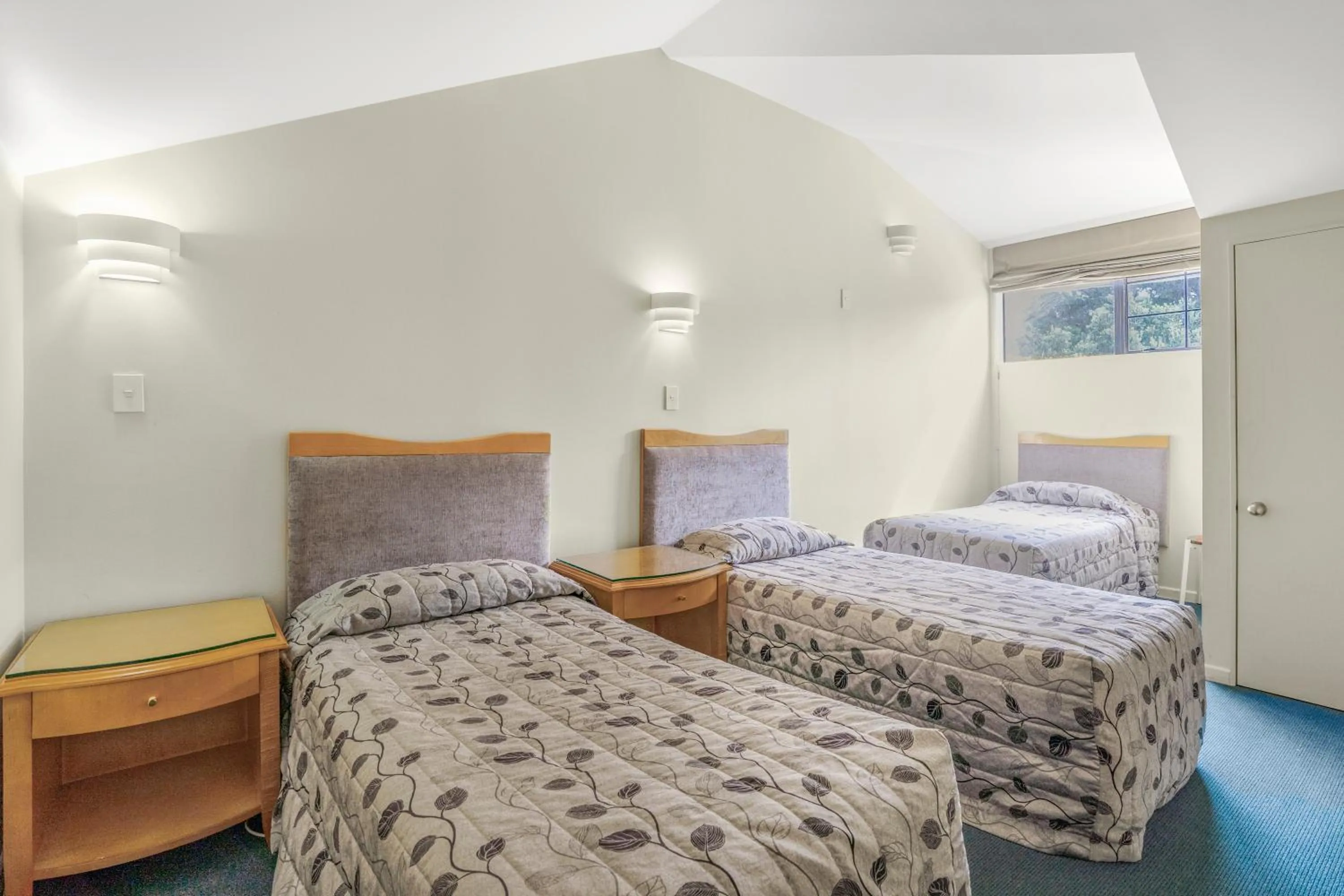 Bed in Capital Lodge Motor Inn