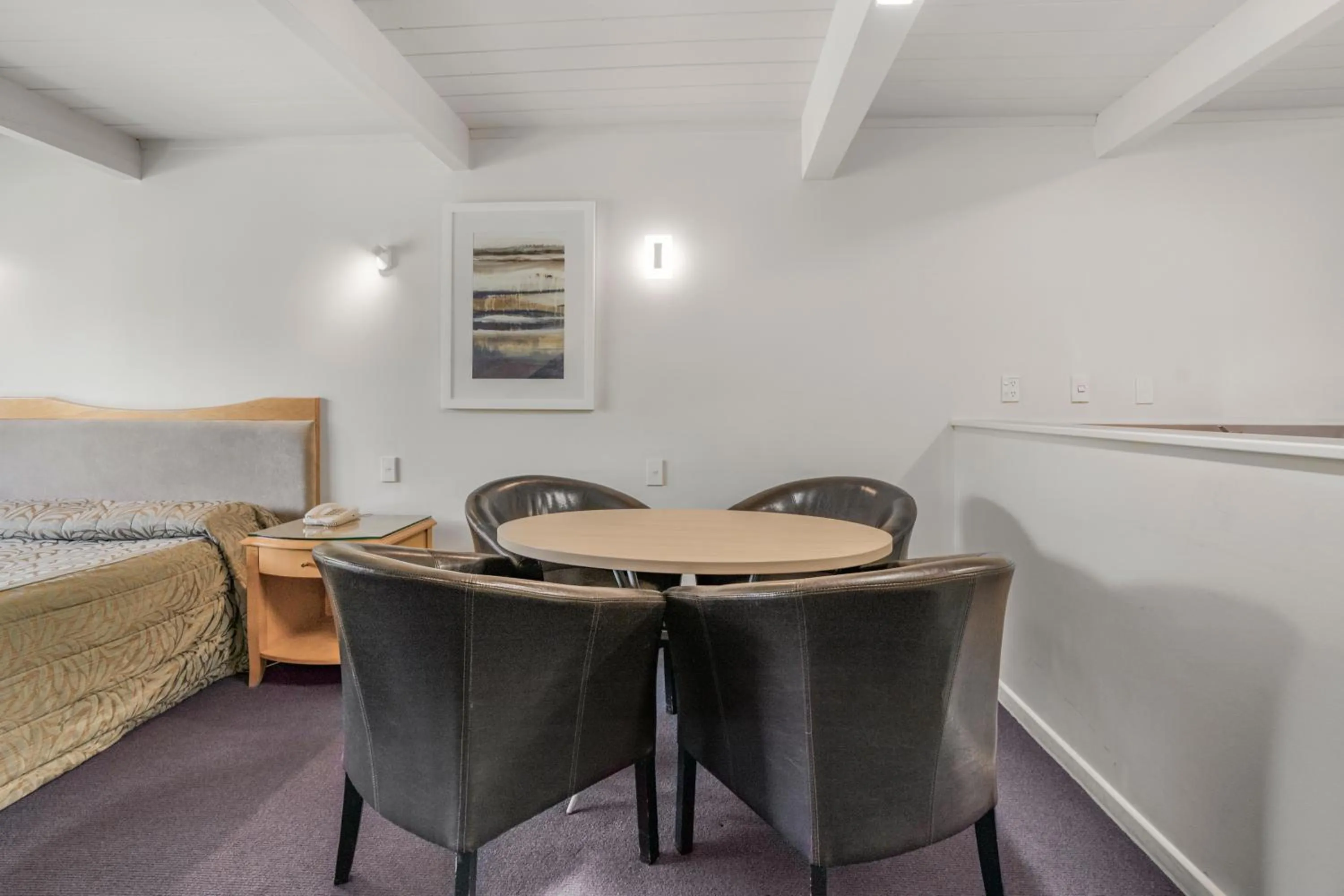 Bed in Capital Lodge Motor Inn