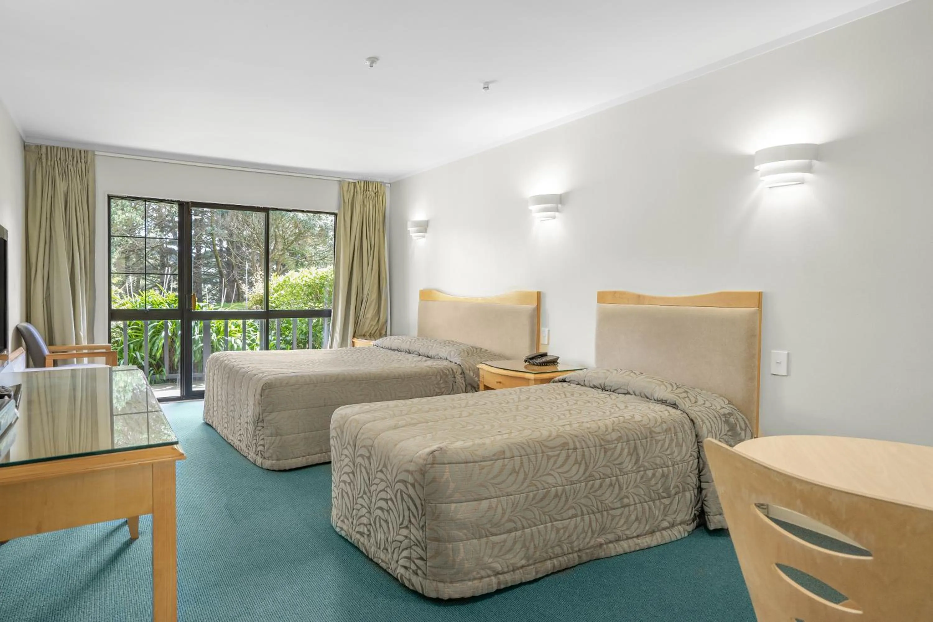 Bed in Capital Lodge Motor Inn