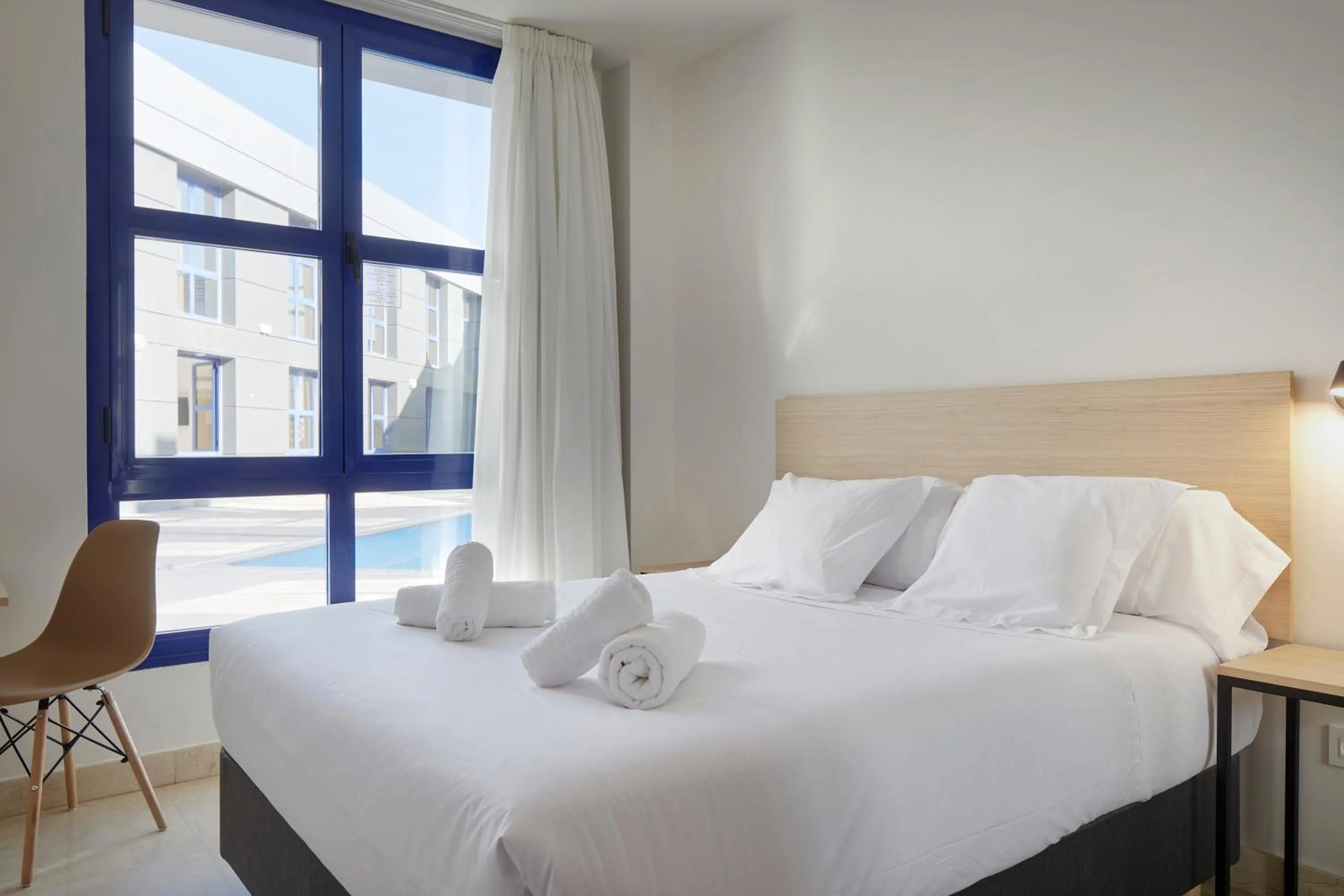 Photo of the whole room, Bed in Iraipe Logroño Hotel