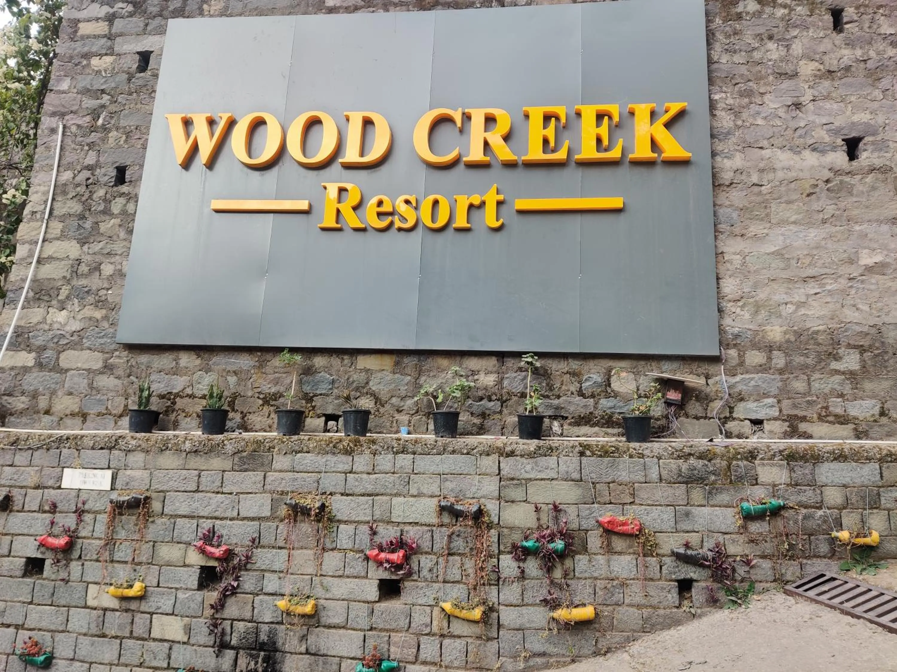 Property logo or sign in Wood Creek Resort & Spa Kasauli