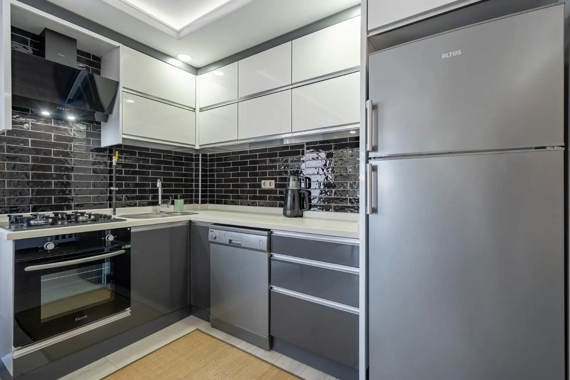Kitchen or kitchenette in ELUXİO SUİTE HOTEL