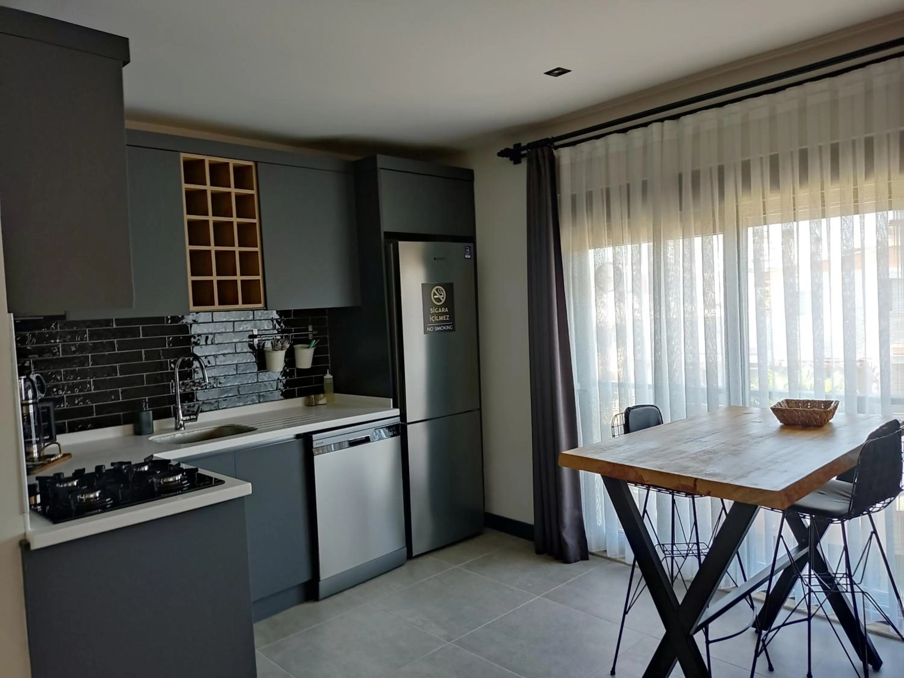 Kitchen or kitchenette in ELUXİO SUİTE HOTEL