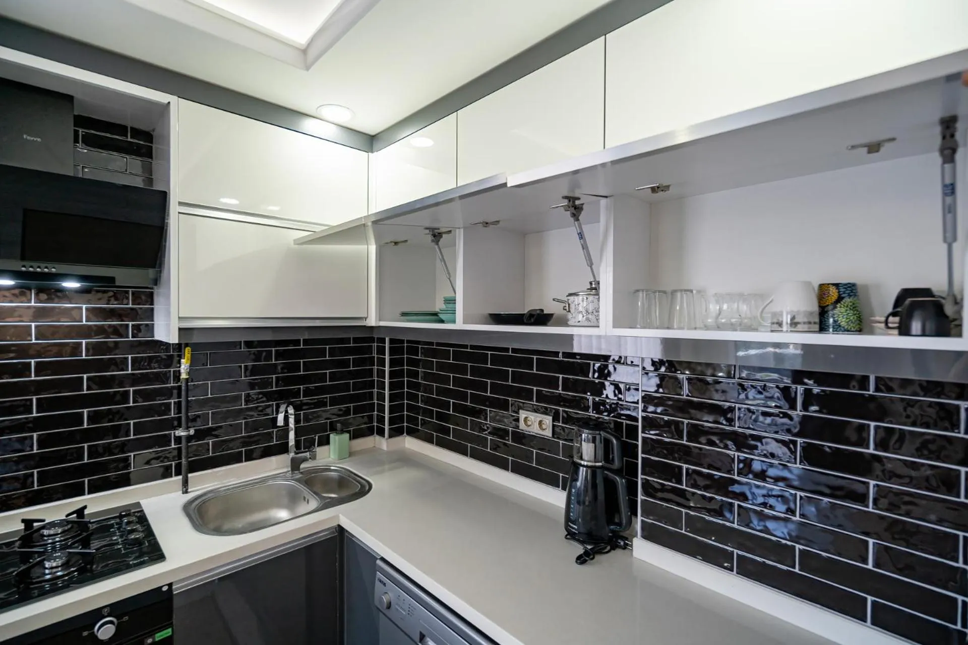 Kitchen or kitchenette in ELUXİO SUİTE HOTEL