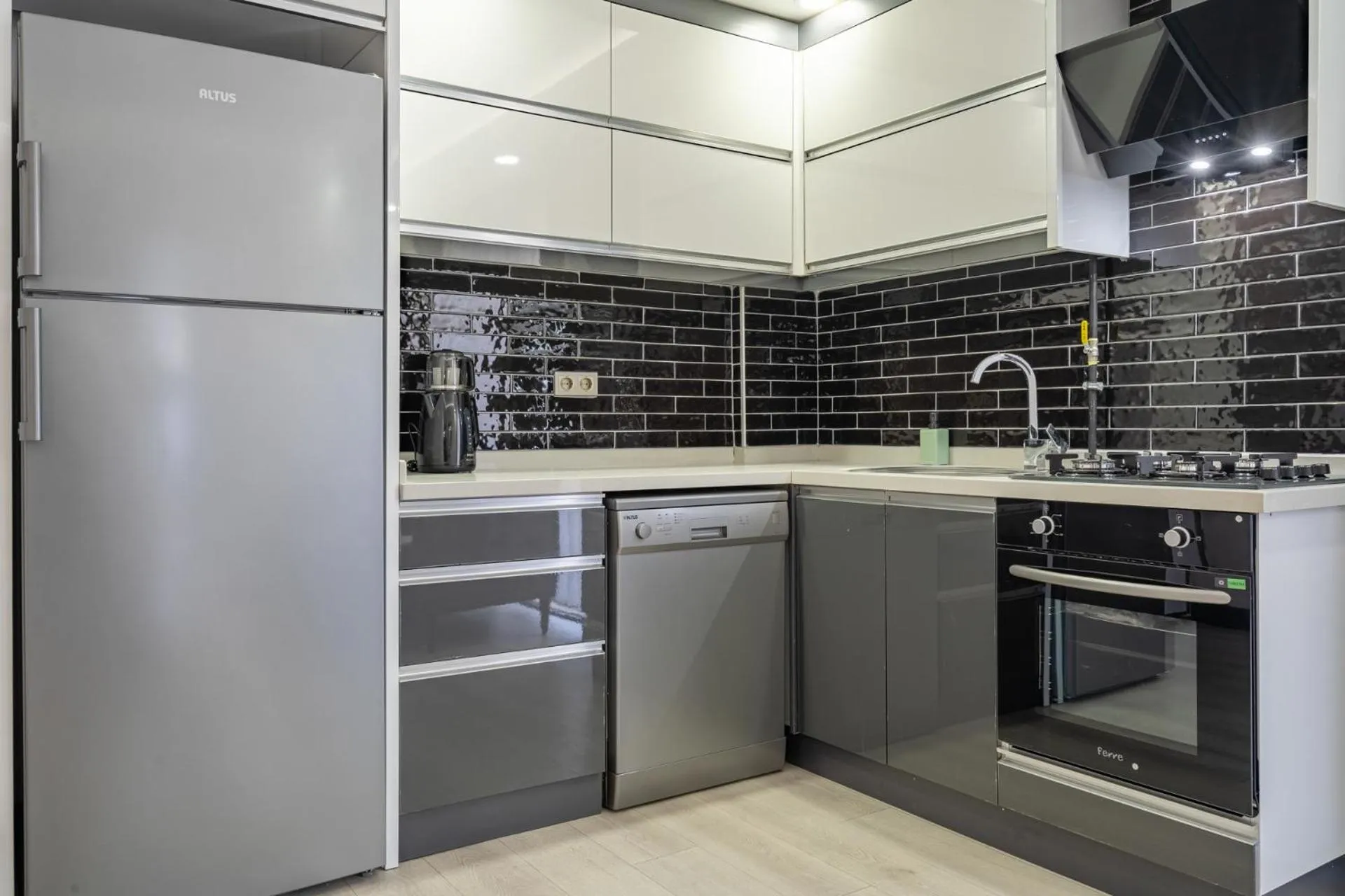 Kitchen or kitchenette in ELUXİO SUİTE HOTEL